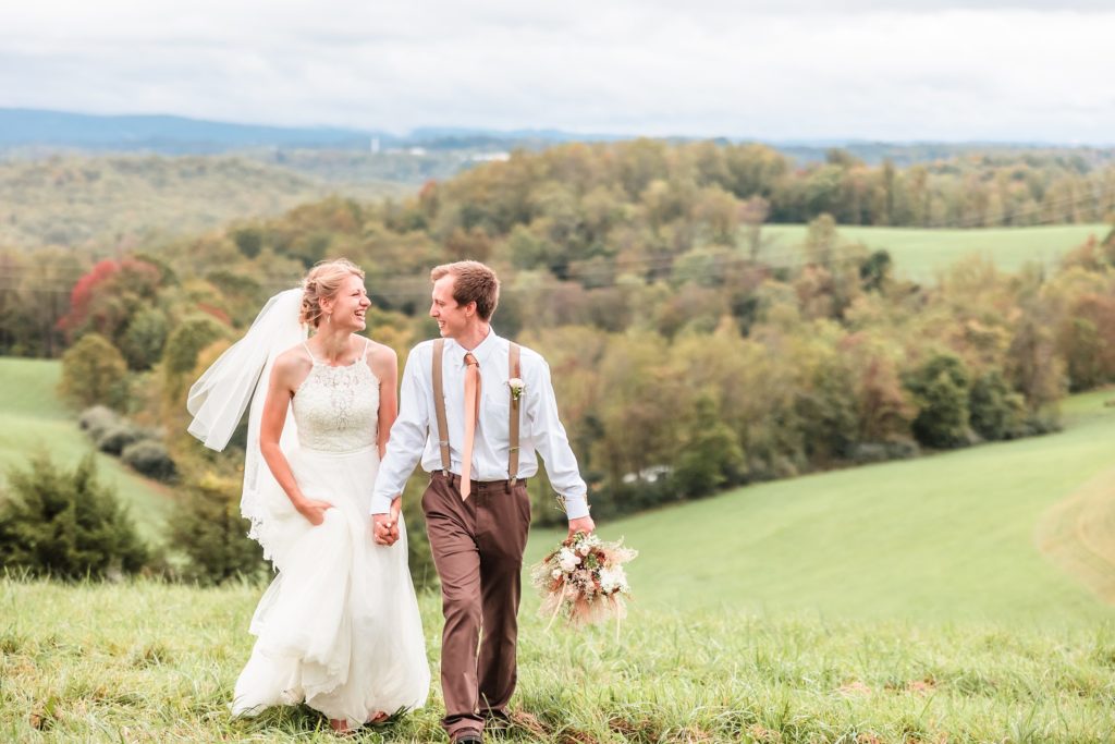 Bride & Groom celebrate becoming Husband and Wife in the Morgantown, West Virginia countryside. Photo by Joanna and Brett Photography, Austin Wedding Photographers