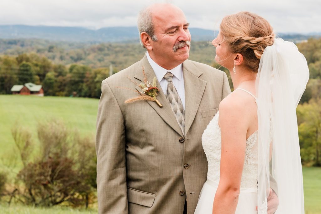 Bride celebrates her wedding with her father in Morgantown, West Virginia. Photo by Joanna and Brett Photography, Austin Wedding Photographers
