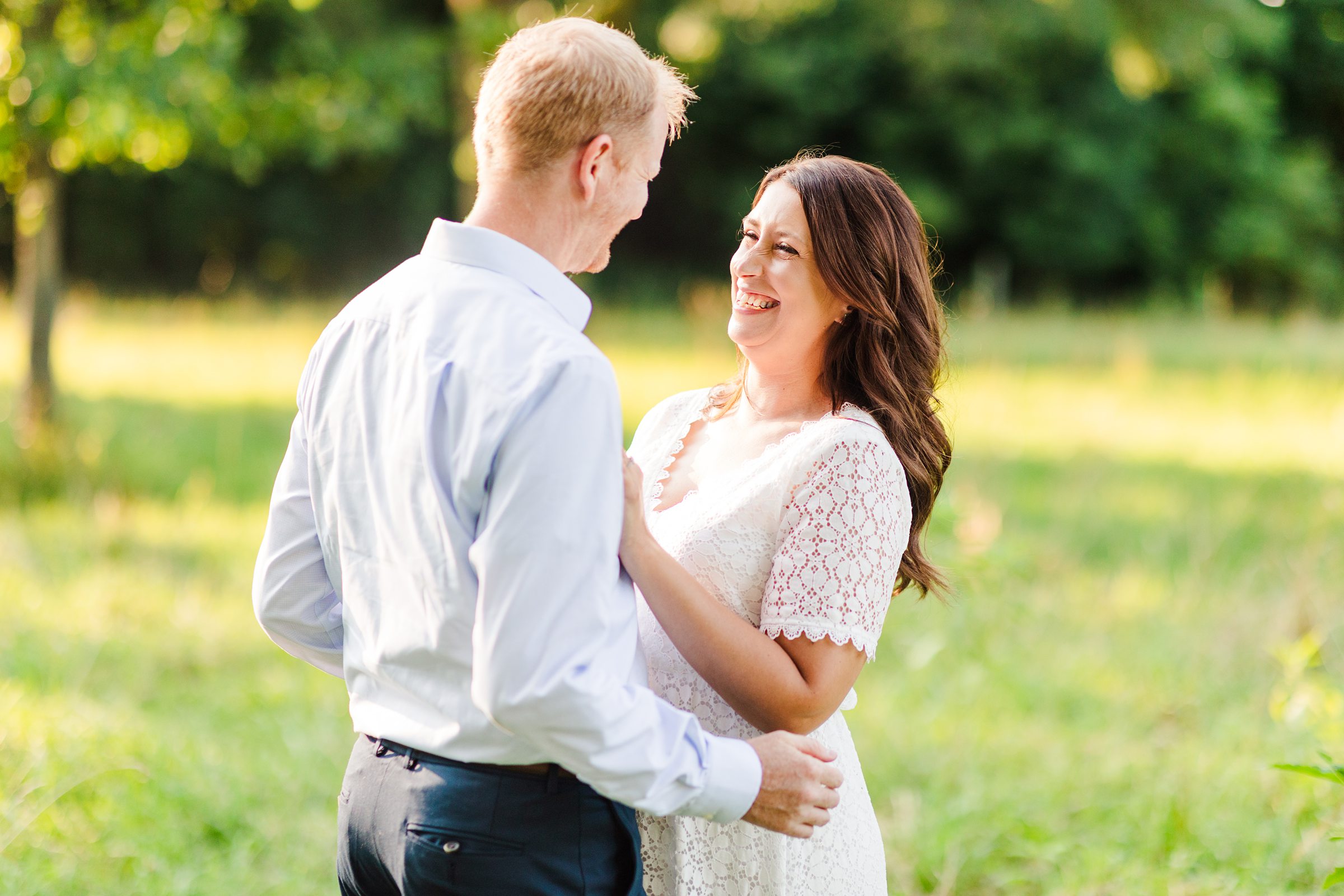 Couple celebrate their engagement in the countryside of central Illinois. Photo taken by Illinois Wedding Photographers, Joanna & Brett