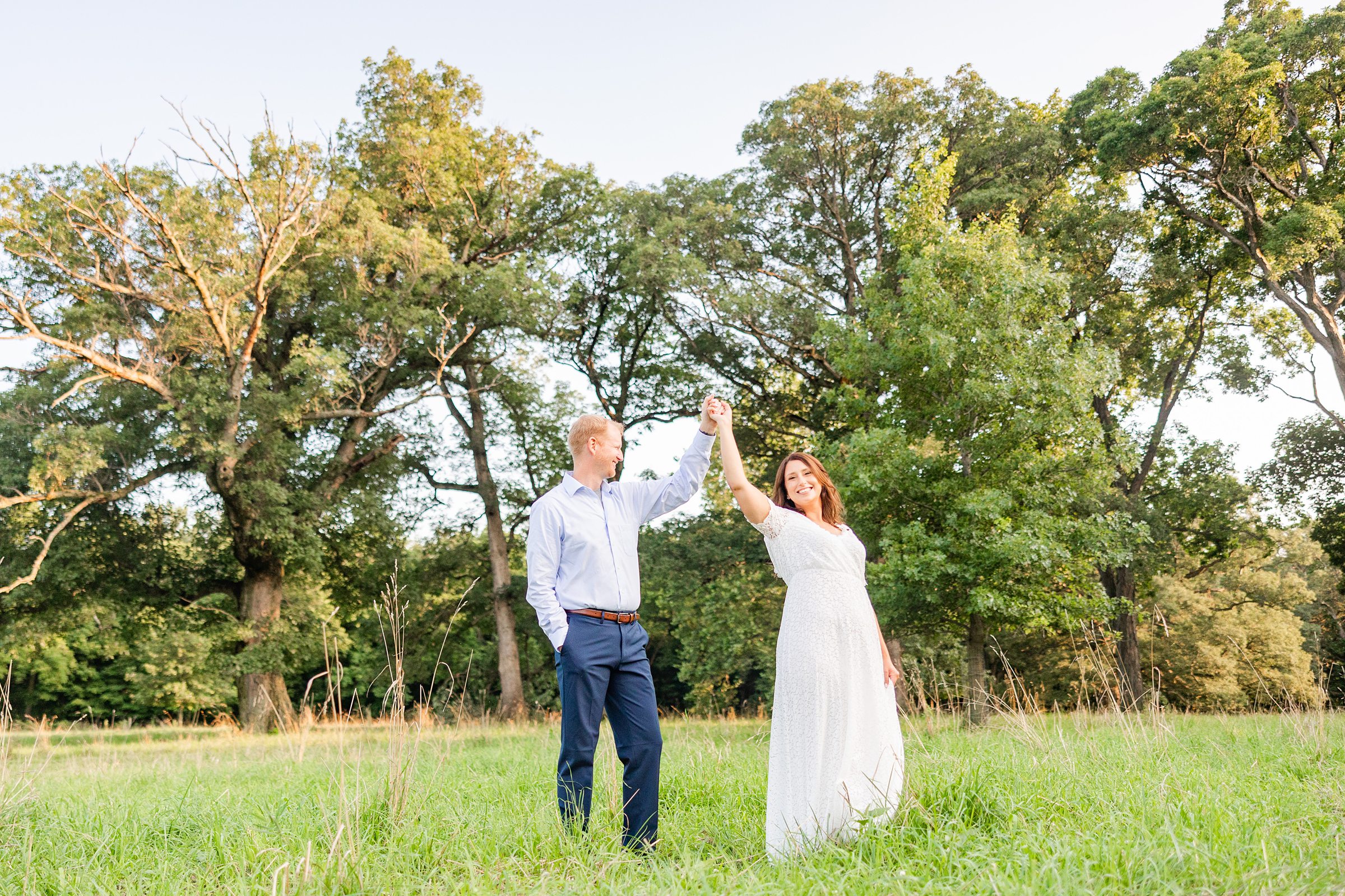 Couple celebrate their engagement in the countryside of central Illinois. Photo taken by Illinois Wedding Photographers, Joanna & Brett