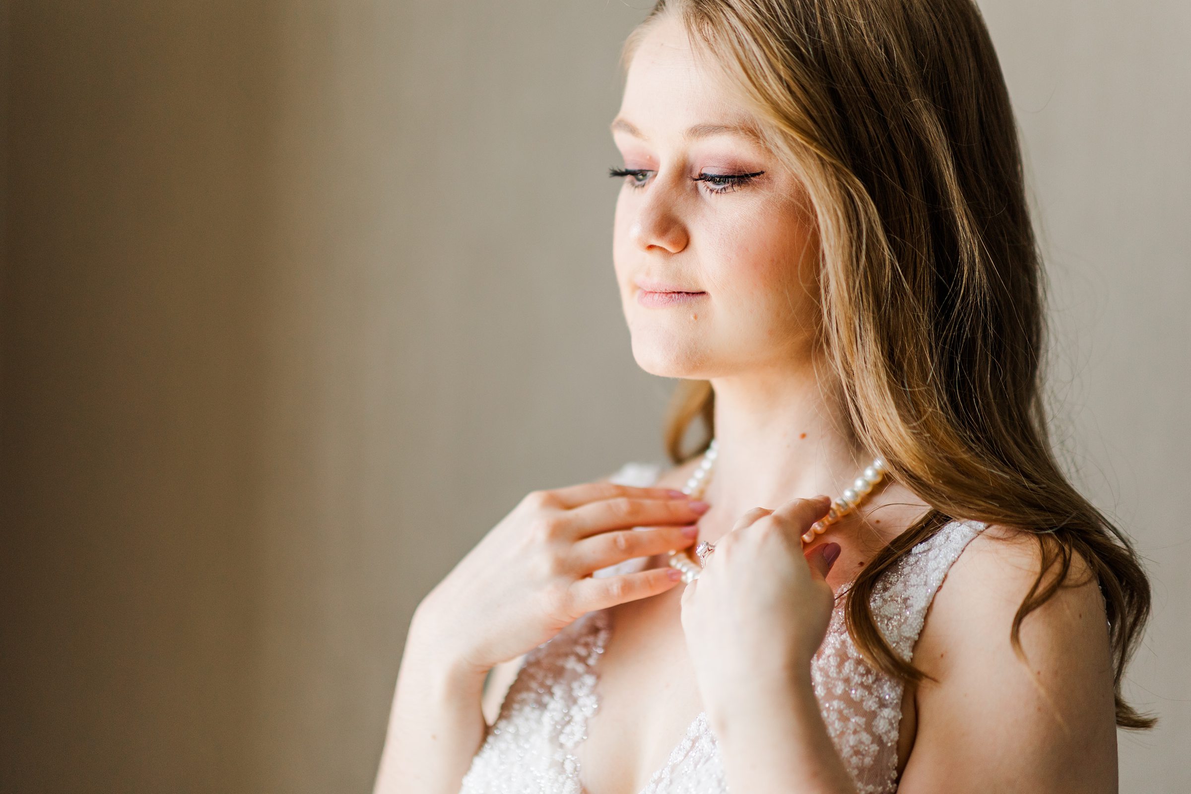 Bride gets ready for her wedding day in Naperville, Illinois, Photo Taken by Austin Wedding Photographers, Joanna & Brett Photography