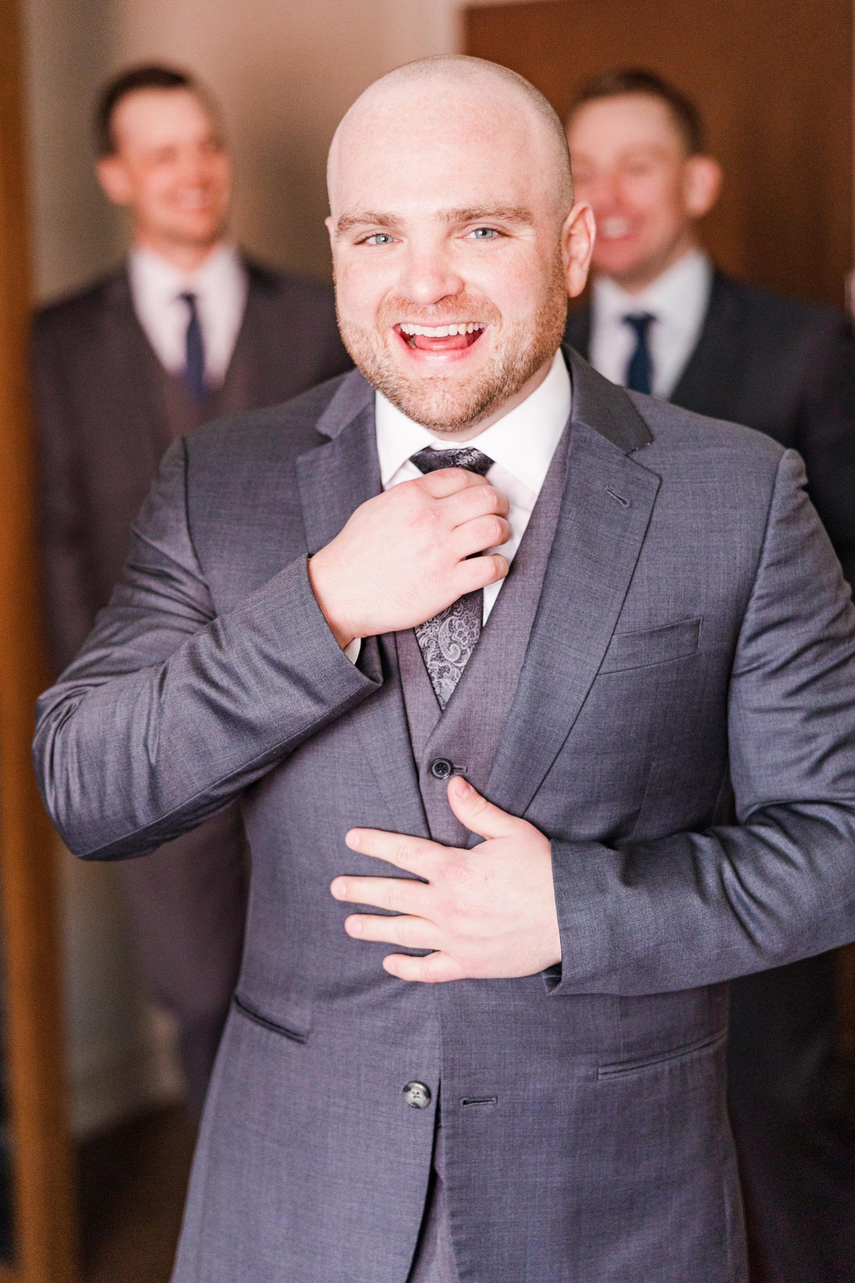 Groom gets ready for her wedding day in Naperville, Illinois, Photo Taken by Austin Wedding Photographers, Joanna & Brett Photography