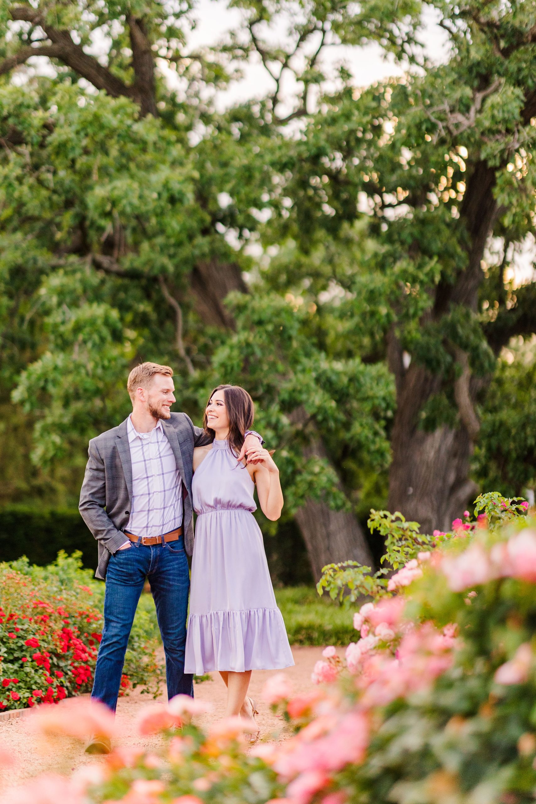 Couple Celebrate their engagement in Cantigny Park in Wheaton, Illinois. Photo taken by Austin Wedding Photographers, Joanna and Brett