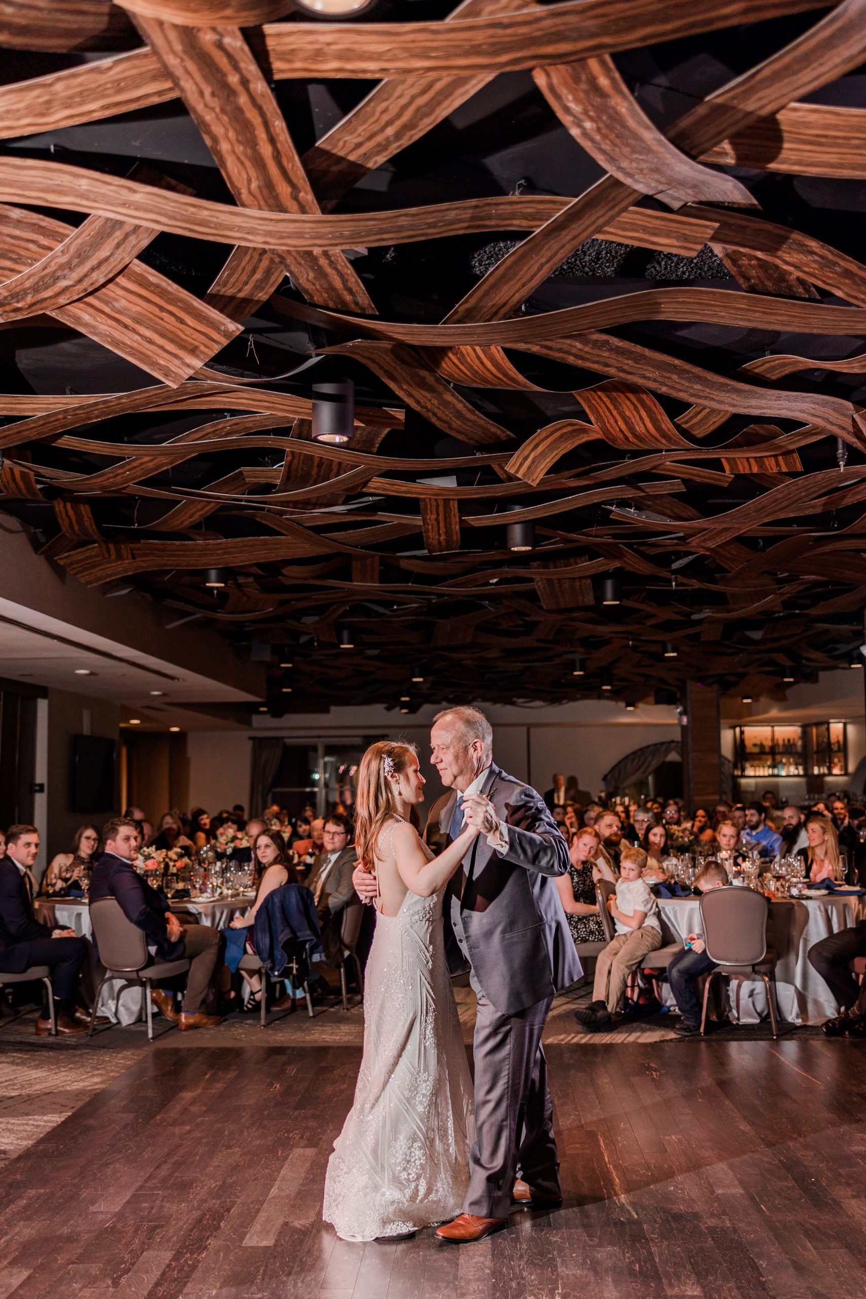 Bride dances with her father at a wedding in Naperville, Illinois. Photo Taken by Austin Wedding Photographers, Joanna & Brett Photography