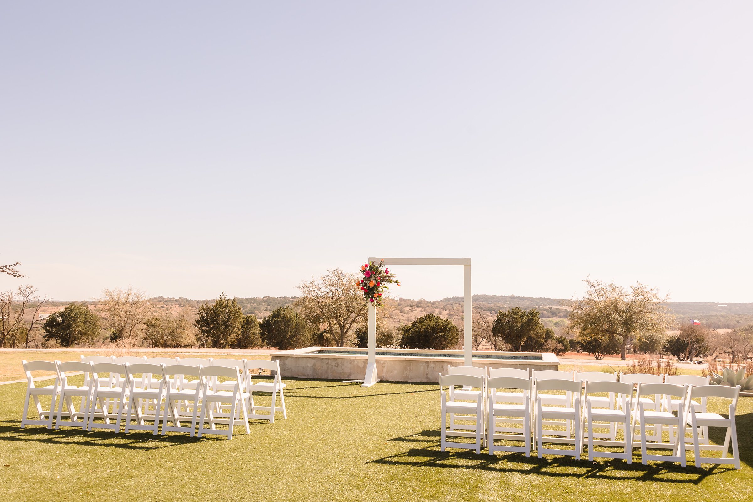 Ceremony space at the Camp Hideaway Retreat wedding venue in Fredericksburg, Texas. Photograph taken by Austin wedding photographers, Joanna and Brett Photography.