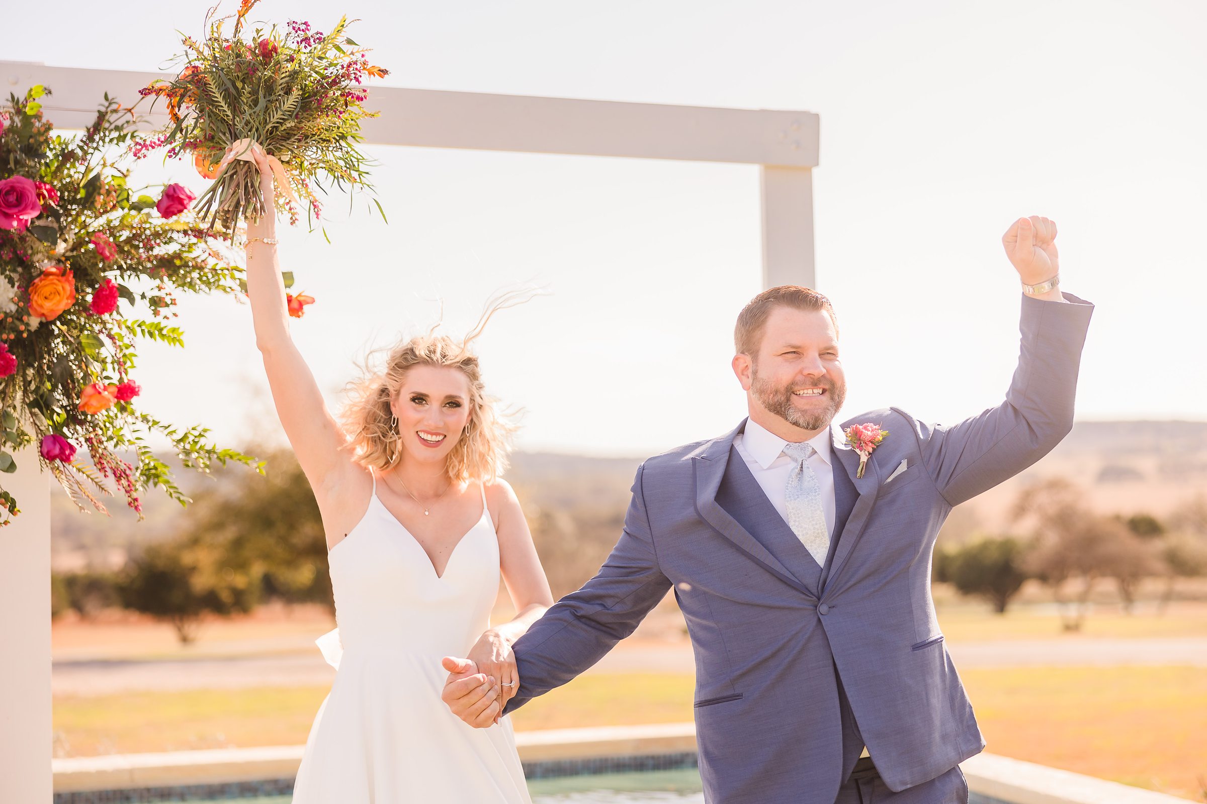 Couple celebrate renewing their vows at the Camp Hideaway Retreat wedding venue in Fredericksburg, Texas. Photograph taken by Austin wedding photographers, Joanna and Brett Photography.