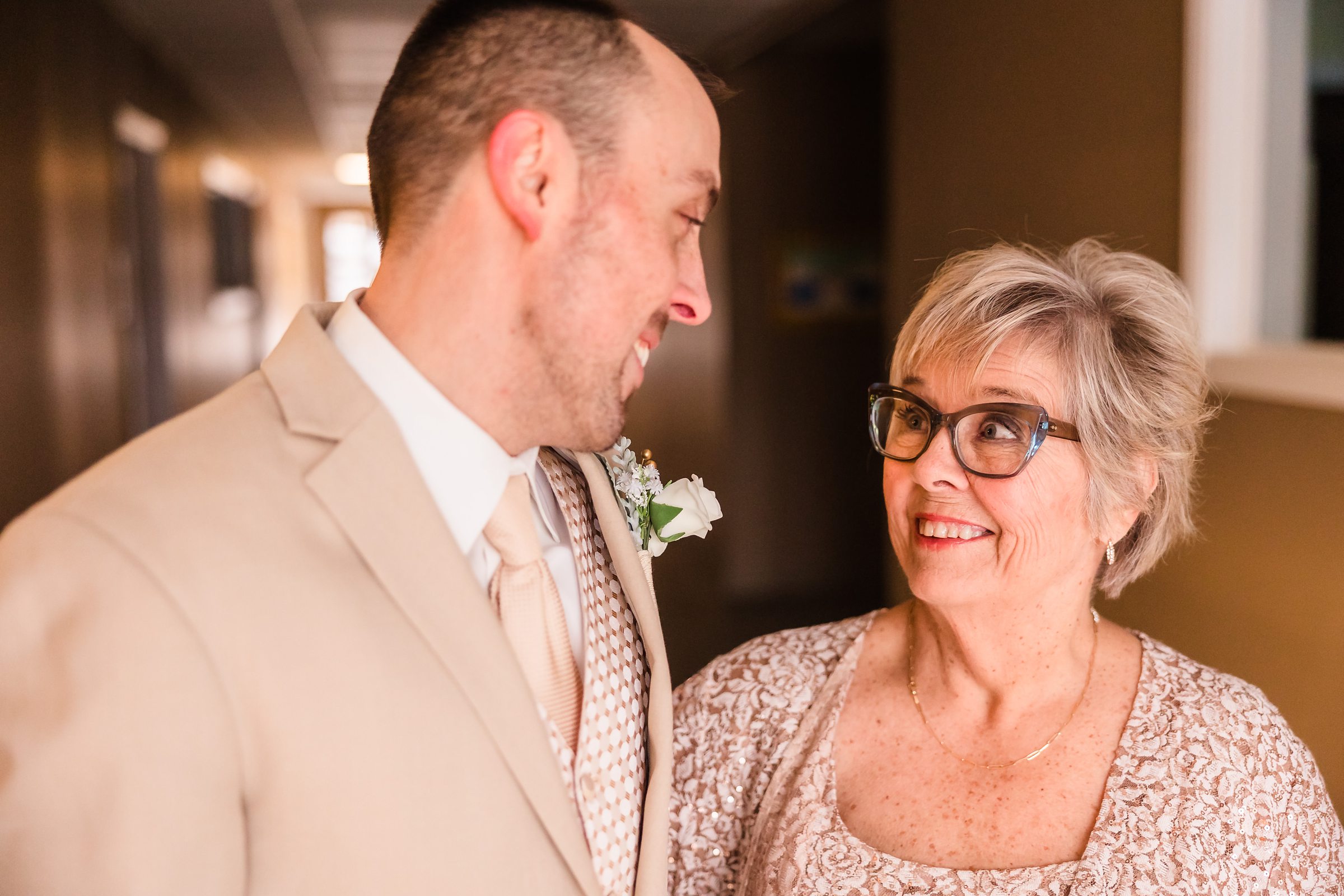 Groom and his mom during his wedding in Bloomington-Normal, Illinois.