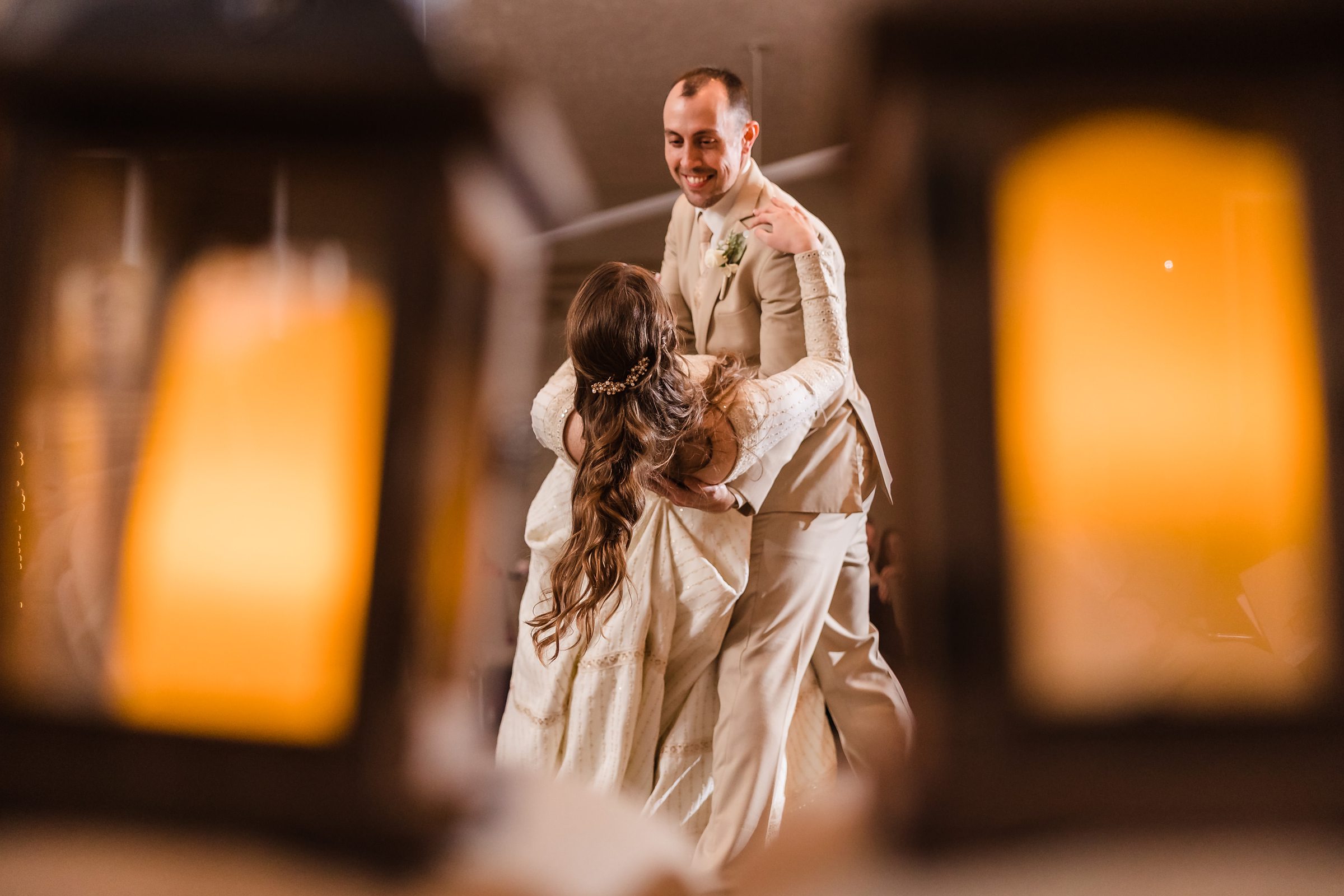 Bride and groom share their first dance during their wedding in Bloomington-Normal, Illinois.