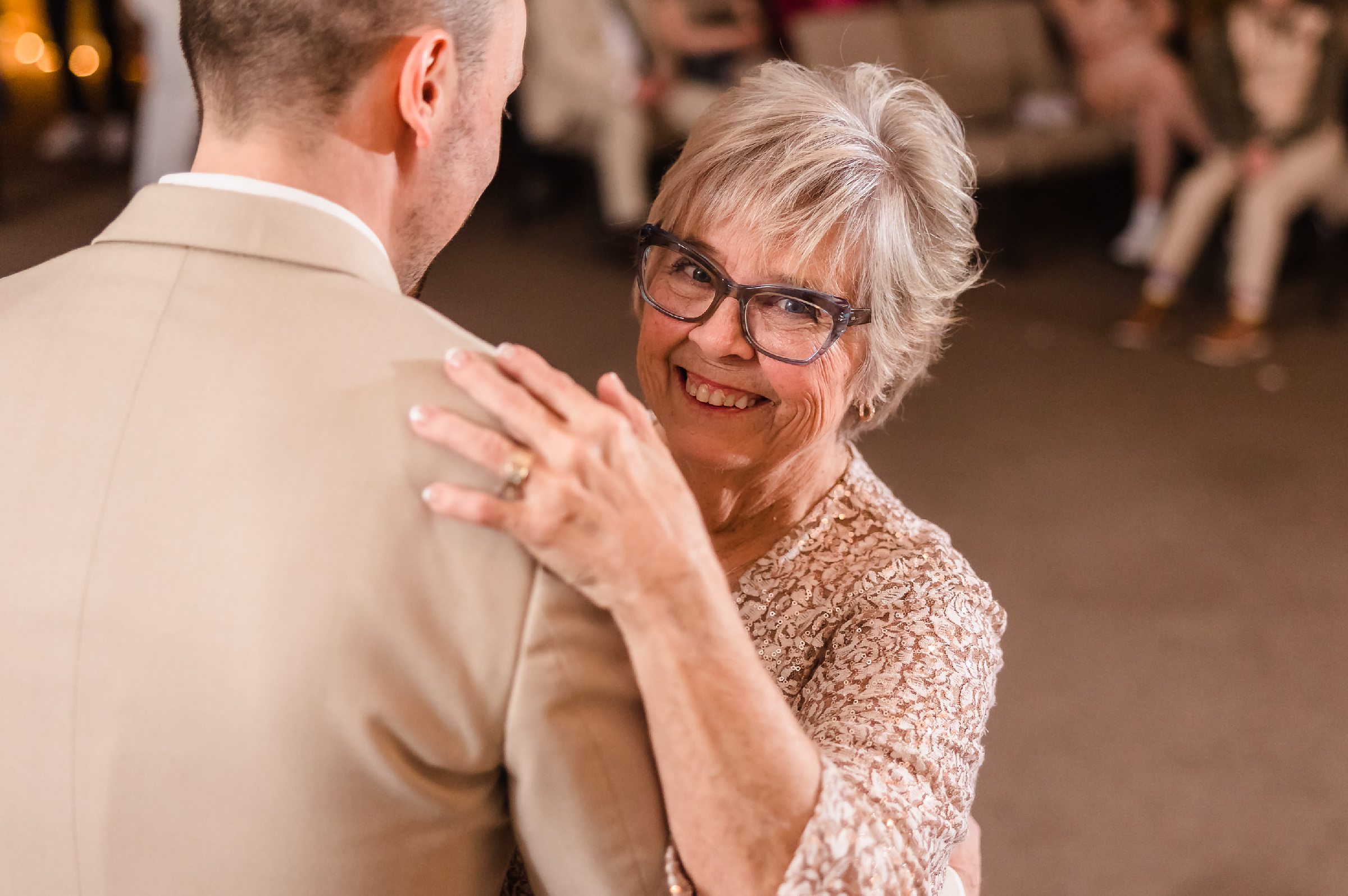 Groom dances with his mother during his wedding in Bloomington-Normal, Illinois.
