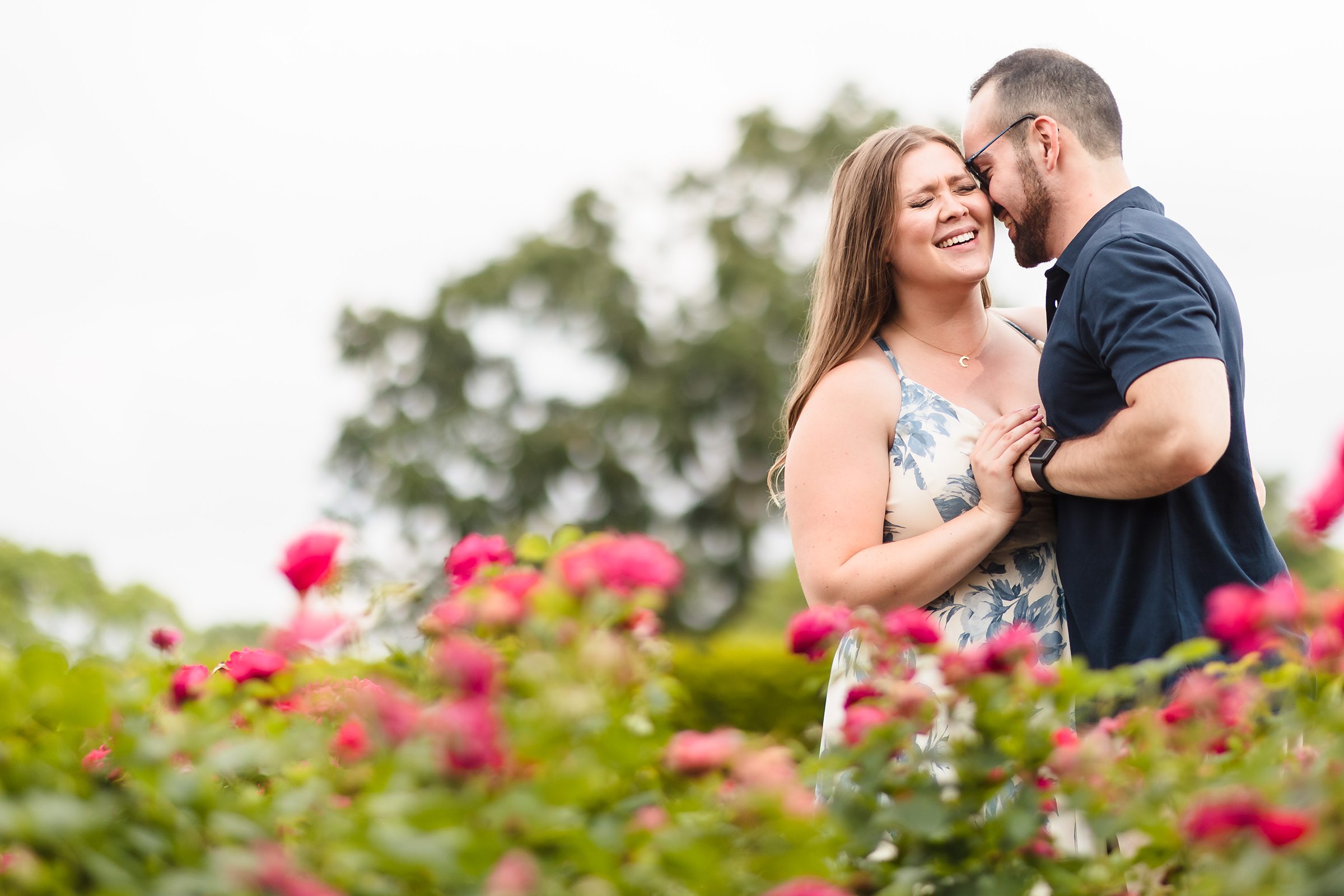 Couple embrace during their engagement session at Cantigny Park in Wheaton, Illinois.