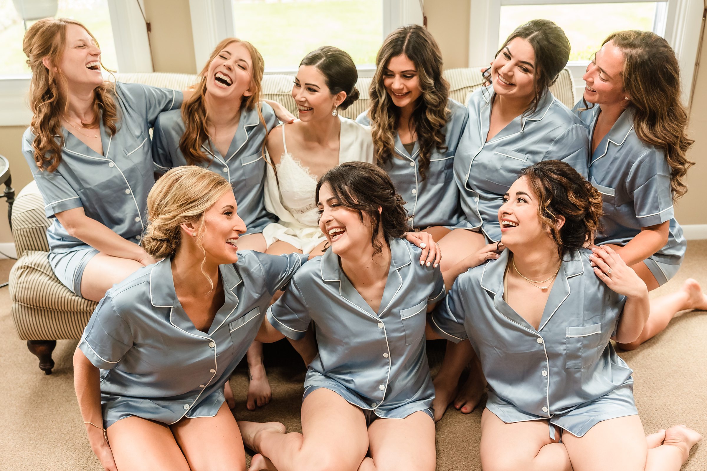 Bride and her bridesmaids before her wedding at the Chevy Chase Country Club in Wheeling, Illinois.