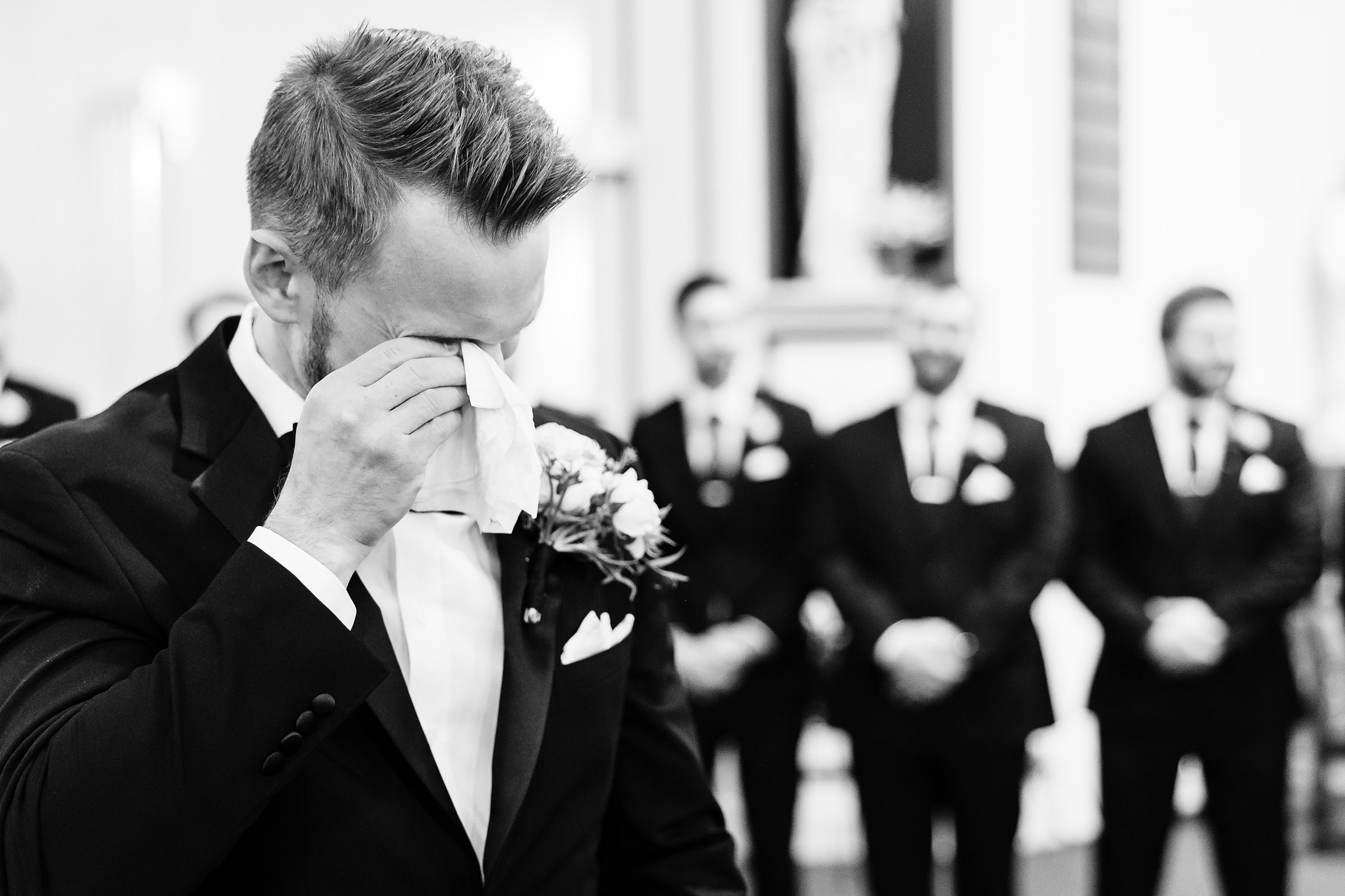 Groom gets emotional during his wedding at Our Lady of the Wayside Church in Illinois.