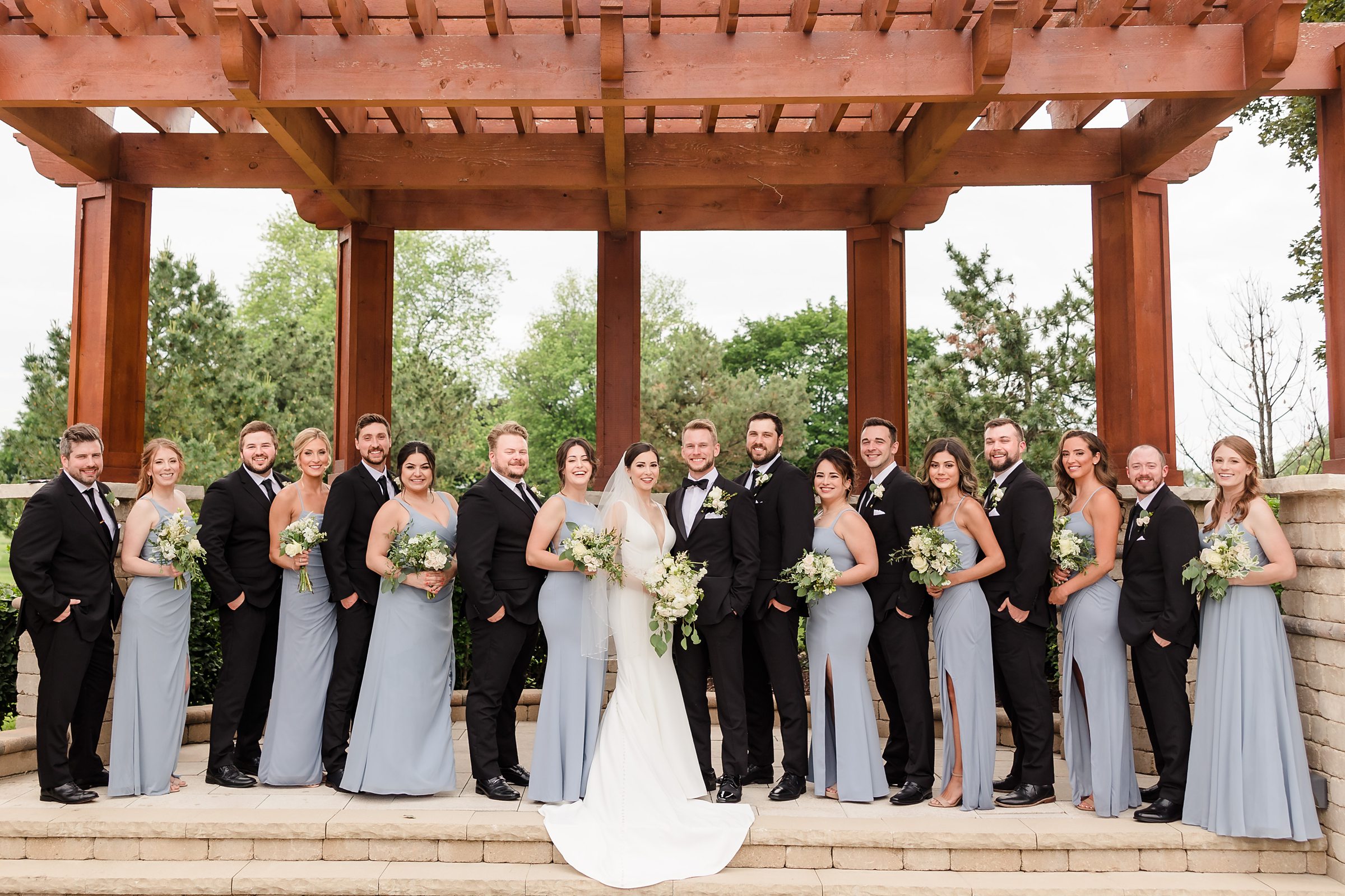 Full Bridal party during a wedding at the Chevy Chase Country Club in Wheeling, Illinois.