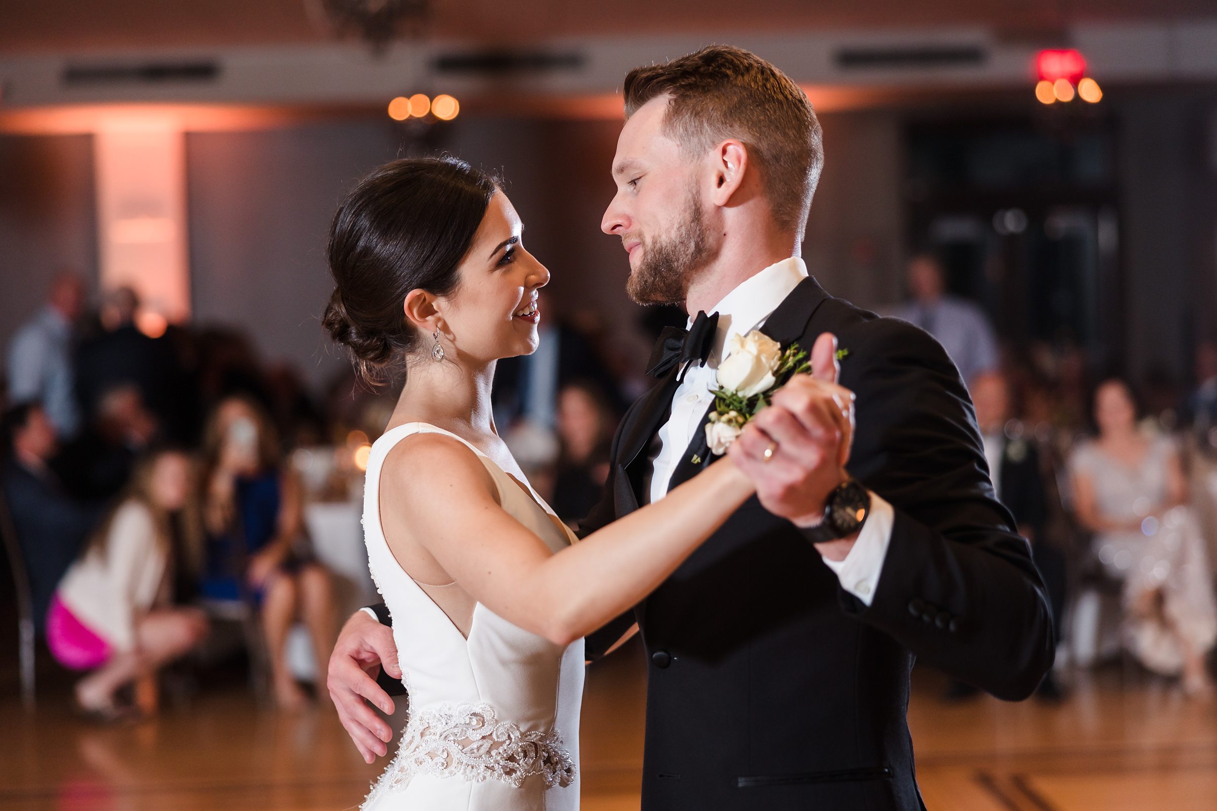 Bride and groom share their first dance during their wedding at the Chevy Chase Country Club in Wheeling, Illinois.
