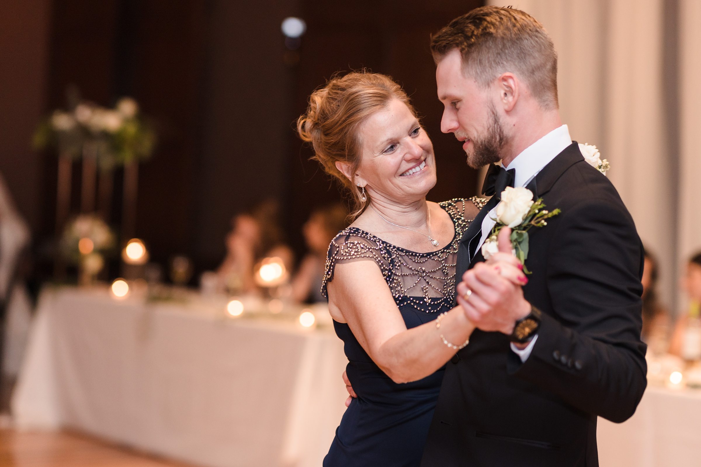 Groom dances with her mom during his wedding at the Chevy Chase Country Club in Wheeling, Illinois.