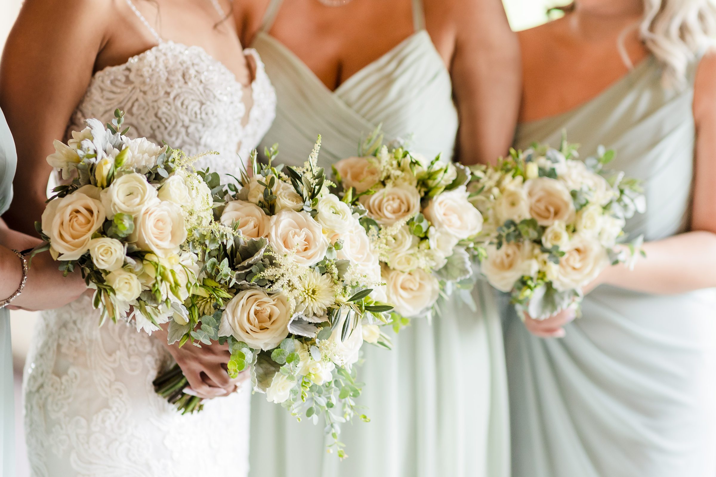 Bride and Bridesmaids florals during a wedding at the Fisherman's Inn in Elburn, Illinois.