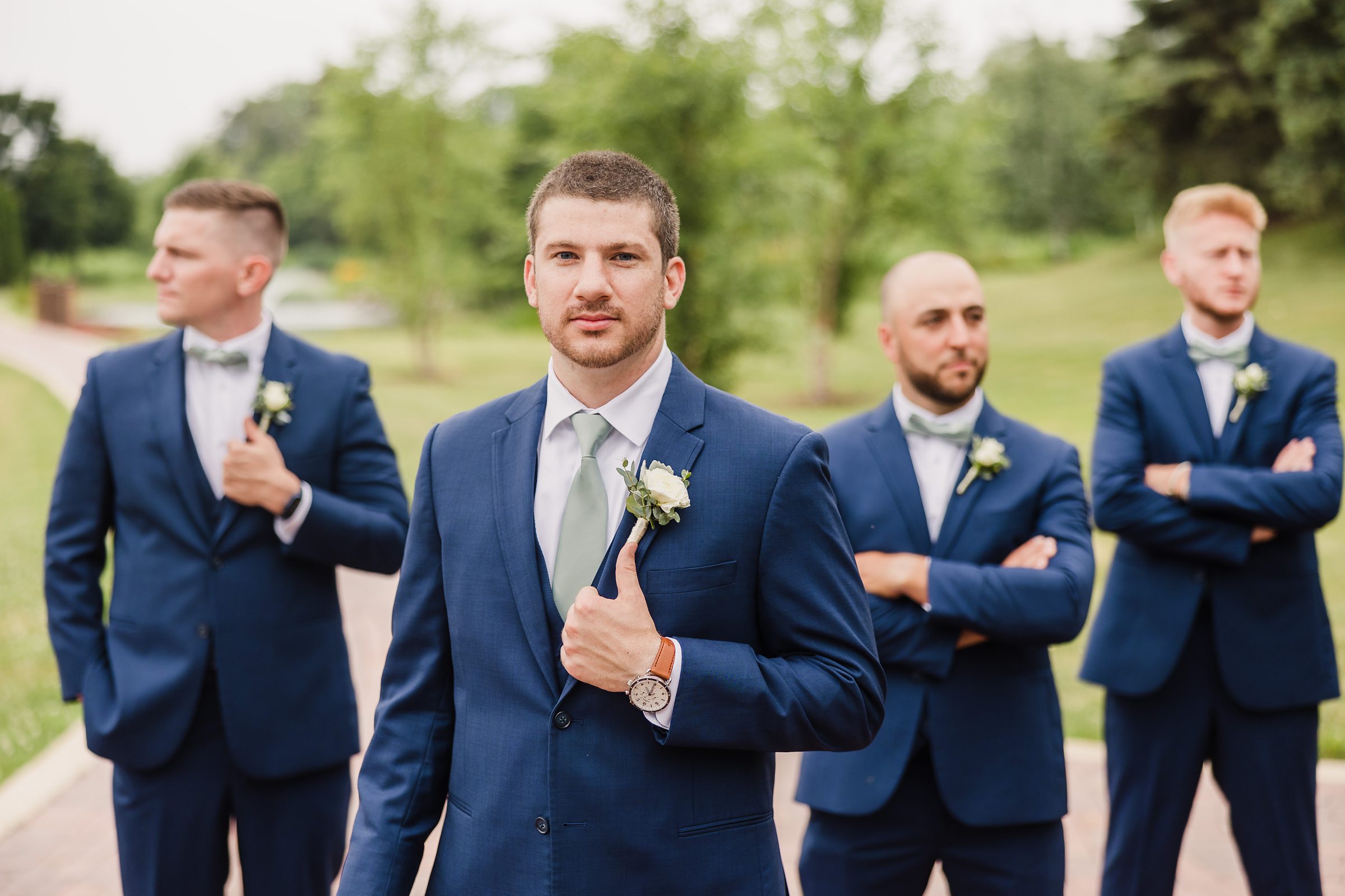 Groom and groomsmen during his wedding at the Fisherman's Inn in Elburn, Illinois.