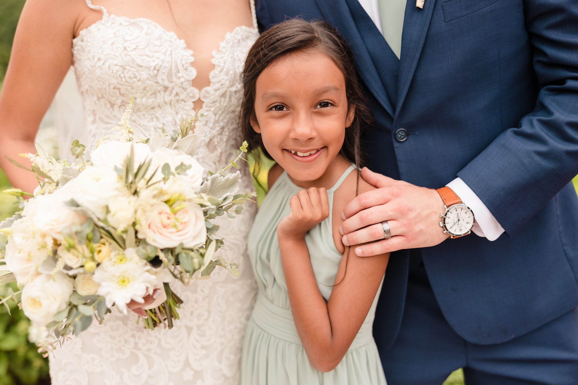 Bride and groom's daughter during their wedding at the Fisherman's Inn in Elburn, Illinois.