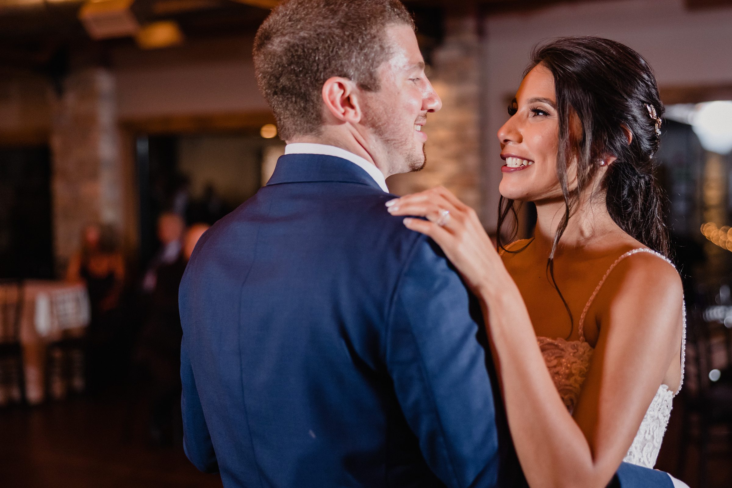 Bride and groom share their first dance during their wedding at the Fisherman's Inn in Elburn, Illinois.