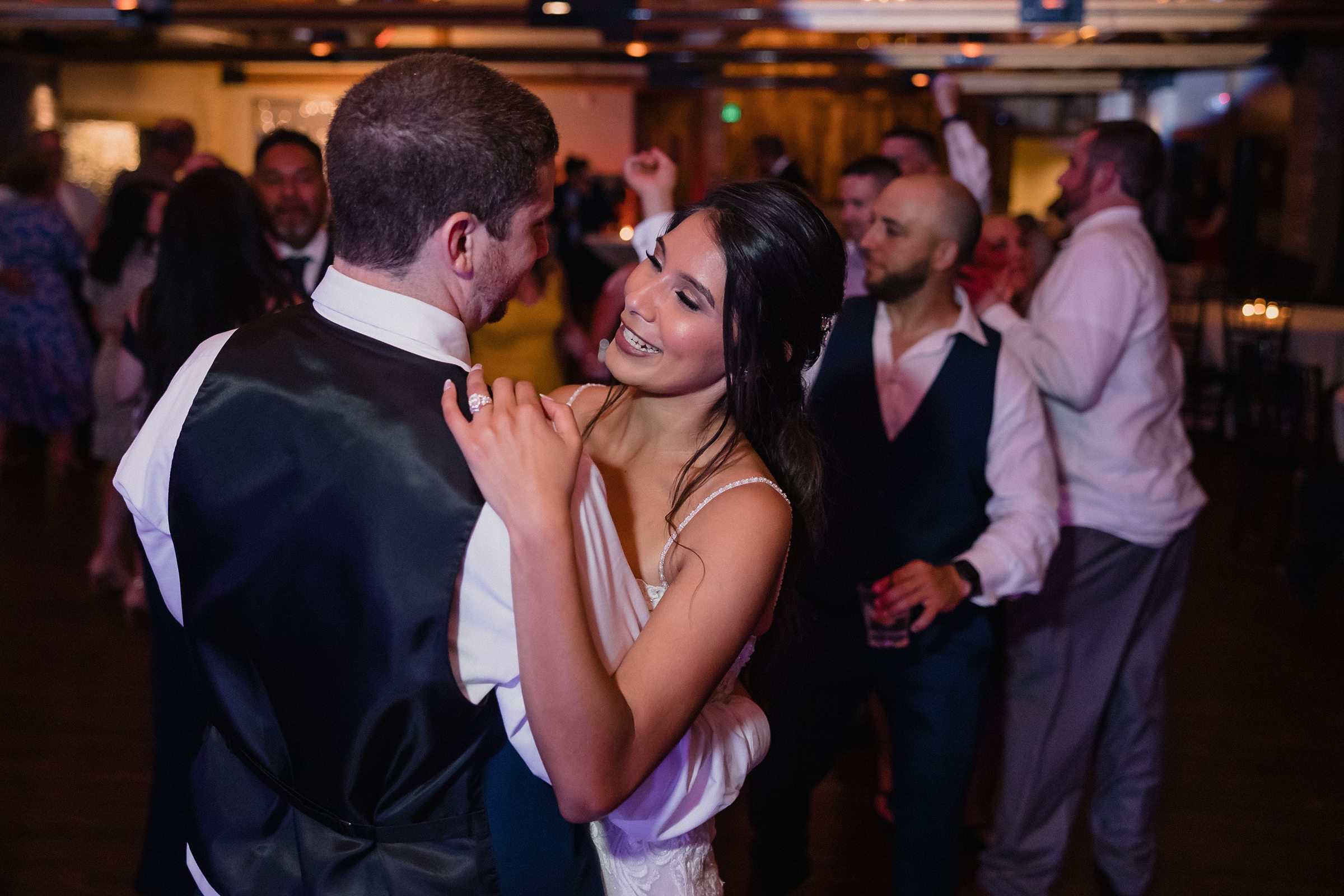 Bride and Groom dance together during their wedding at the Fisherman's Inn in Elburn, Illinois.