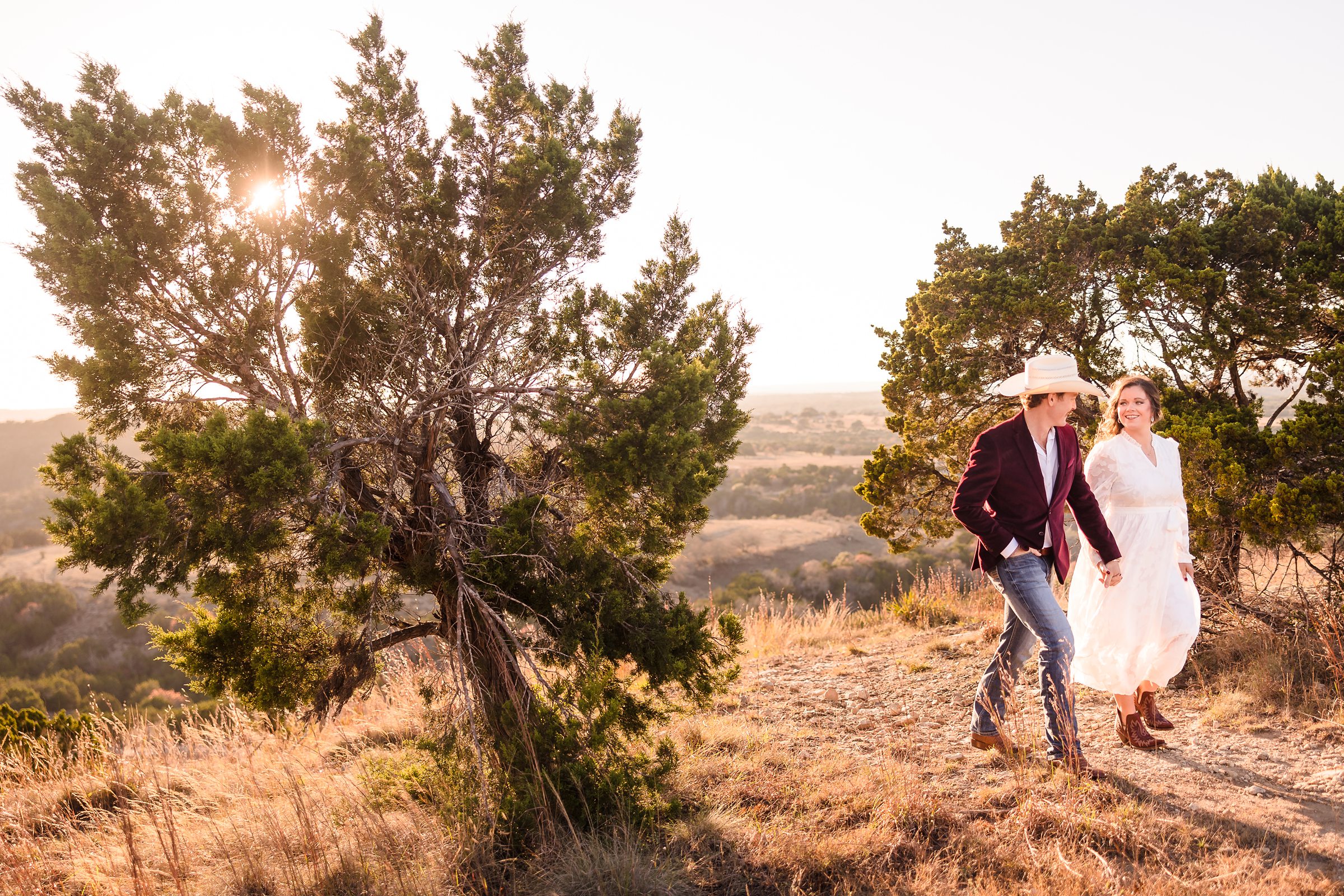 Bride and Groom walk together during their elopement in Dripping Springs, Texas