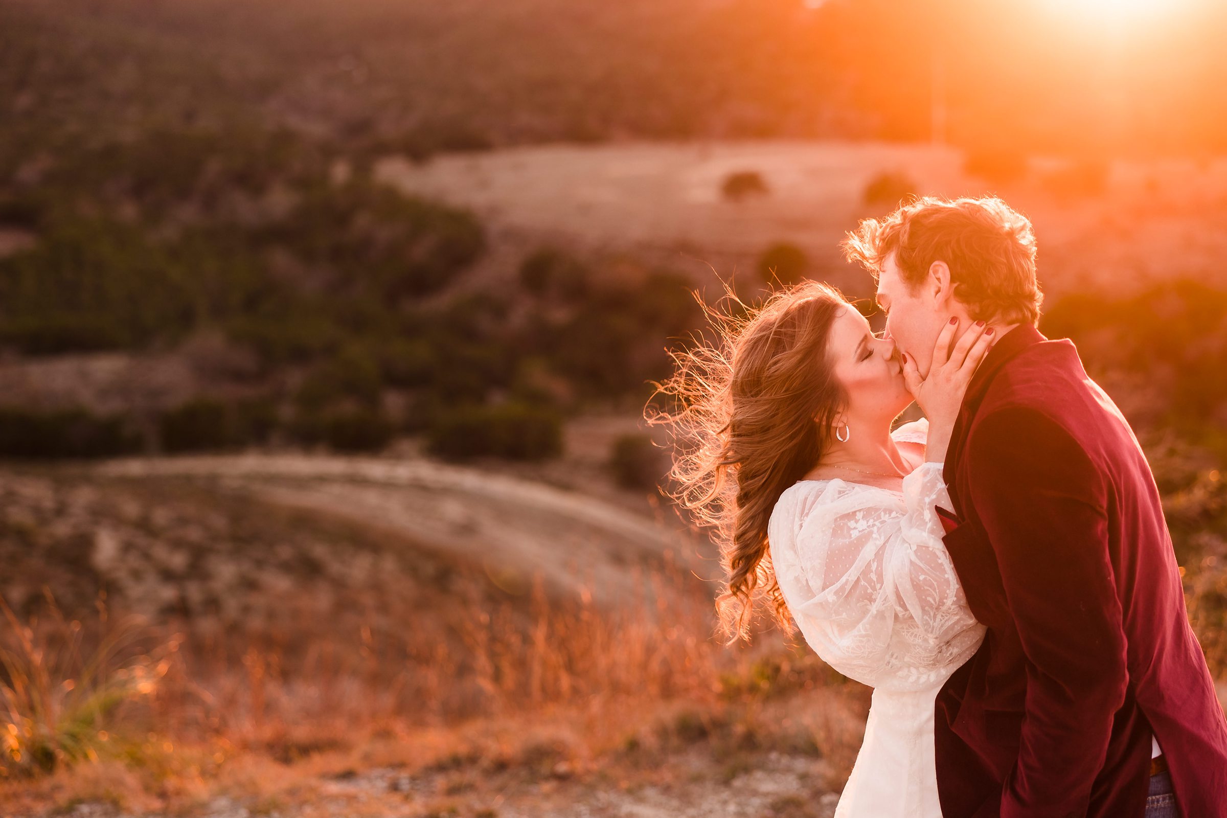 Bride and Groom embrace during their elopement in Dripping Springs, Texas