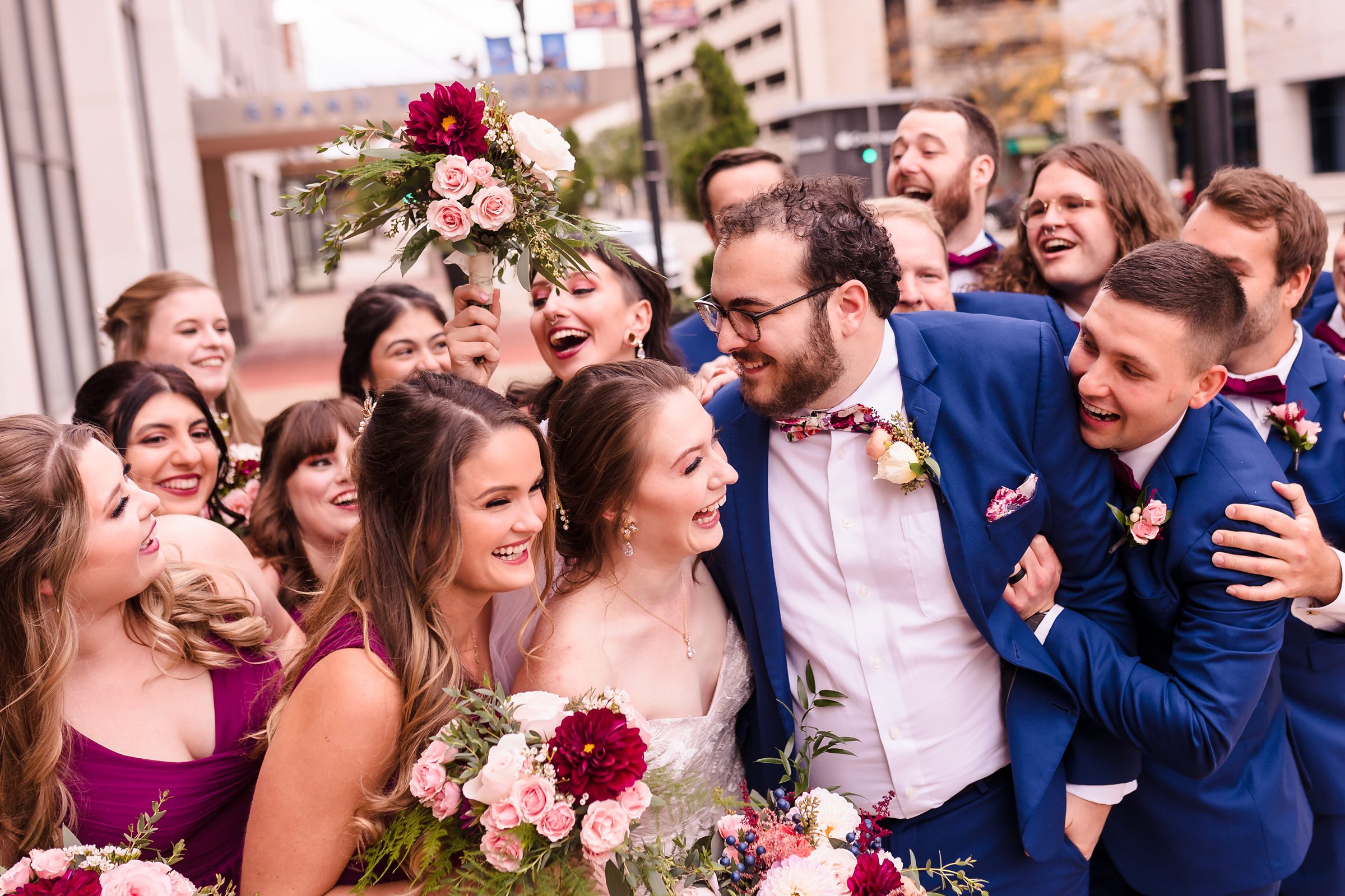 Bridal party celebrate with the couple before a wedding at the Hotel Pere Marquette in Peoria, Illinois.