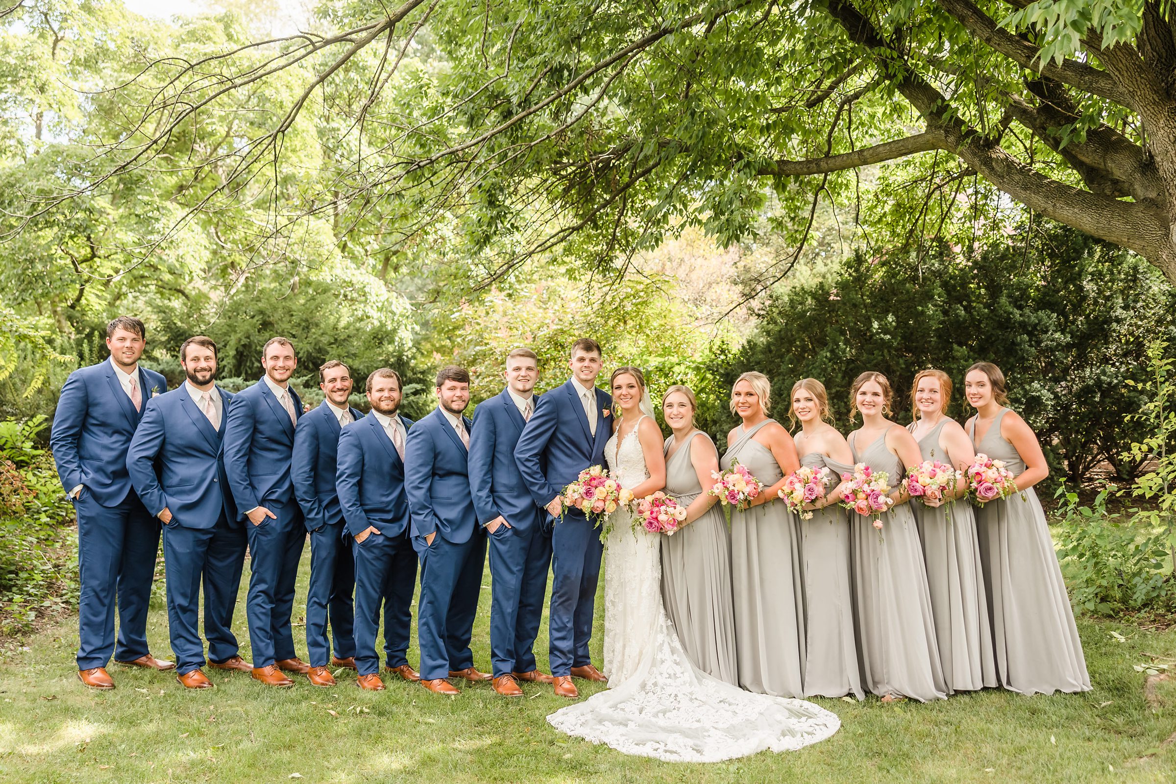 Full bridal party during a wedding at the Luthy Botanical Garden in Peoria, Illinois