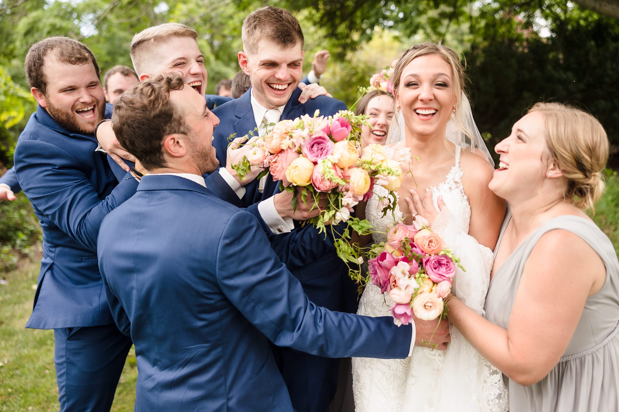 Bridal party celebrates a wedding at the Luthy Botanical Garden in Peoria, Illinois