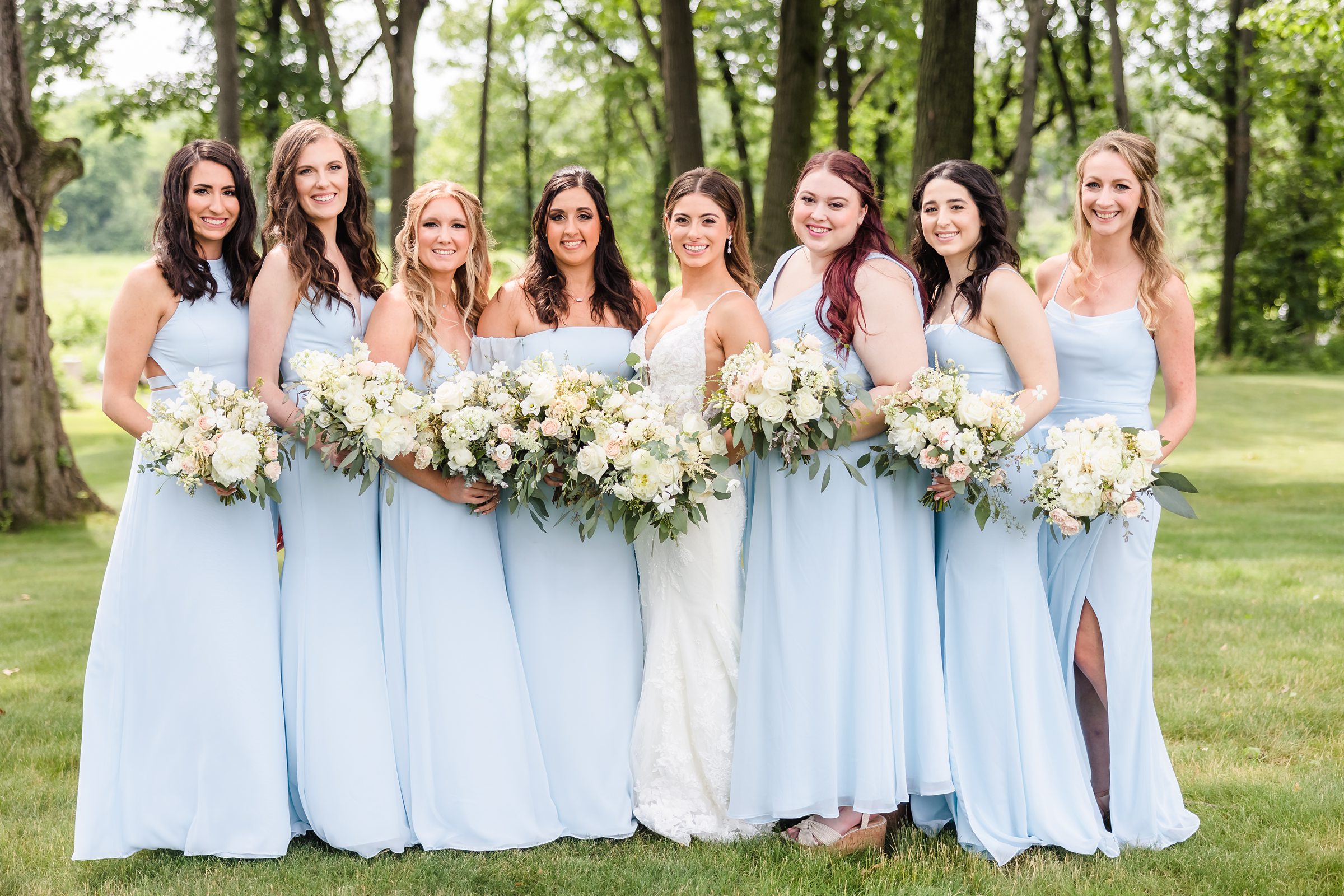 Bride with Bridesmaid during a wedding at the Monte Bello Estate in Lemont, Illinois.