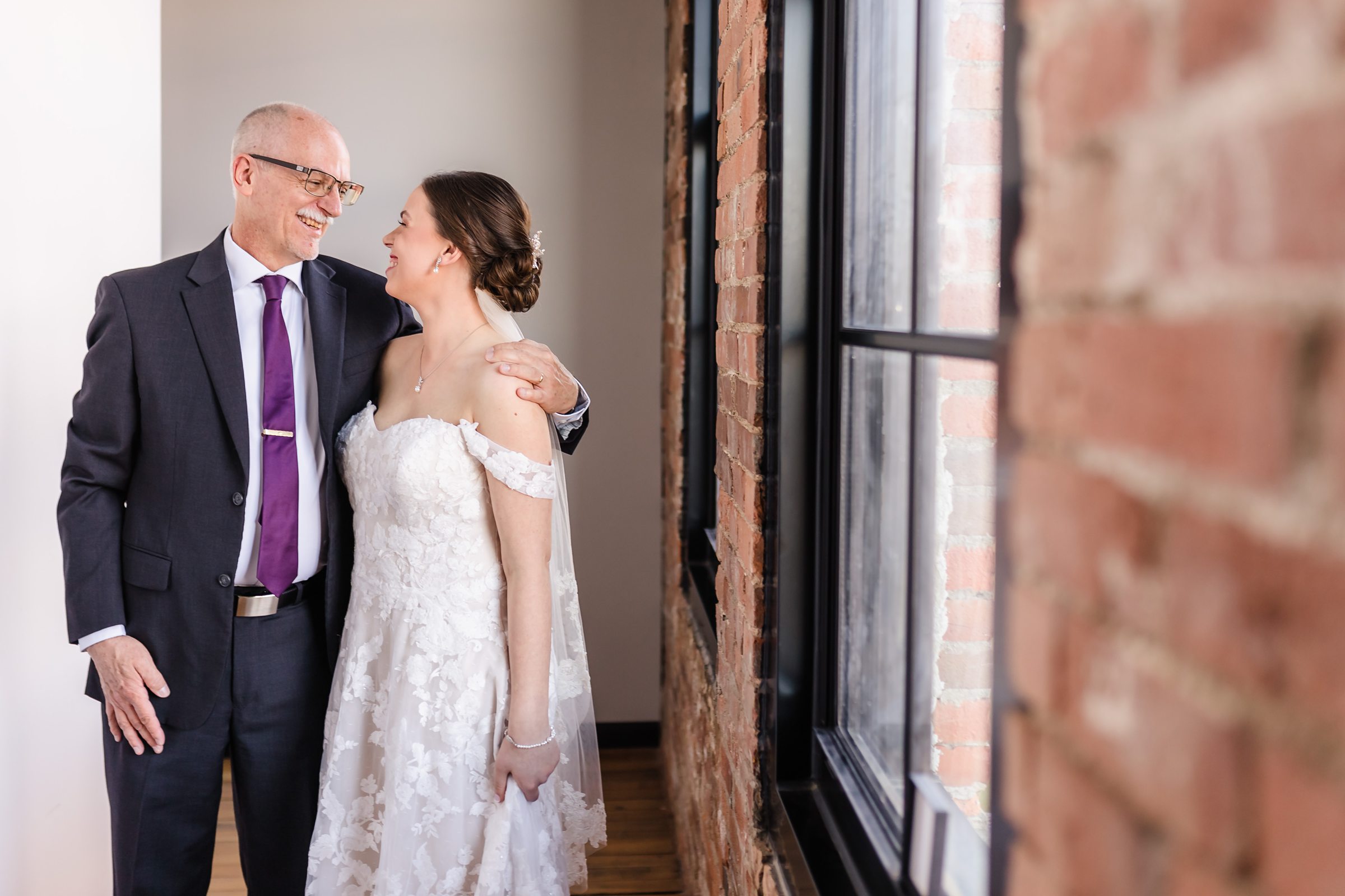 Dad shares a special moment with the bride before her wedding at the Trailside Event Center in Peoria Heights, Illinois.
