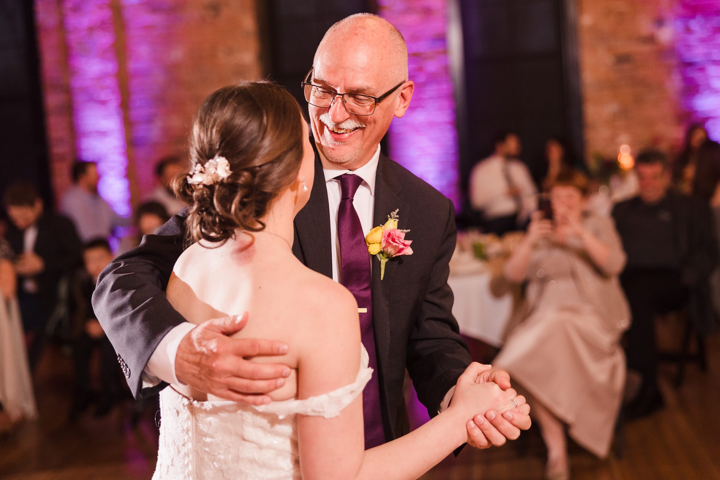 Bride dances with her father during her wedding at the Trailside Event Center in Peoria Heights, Illinois.