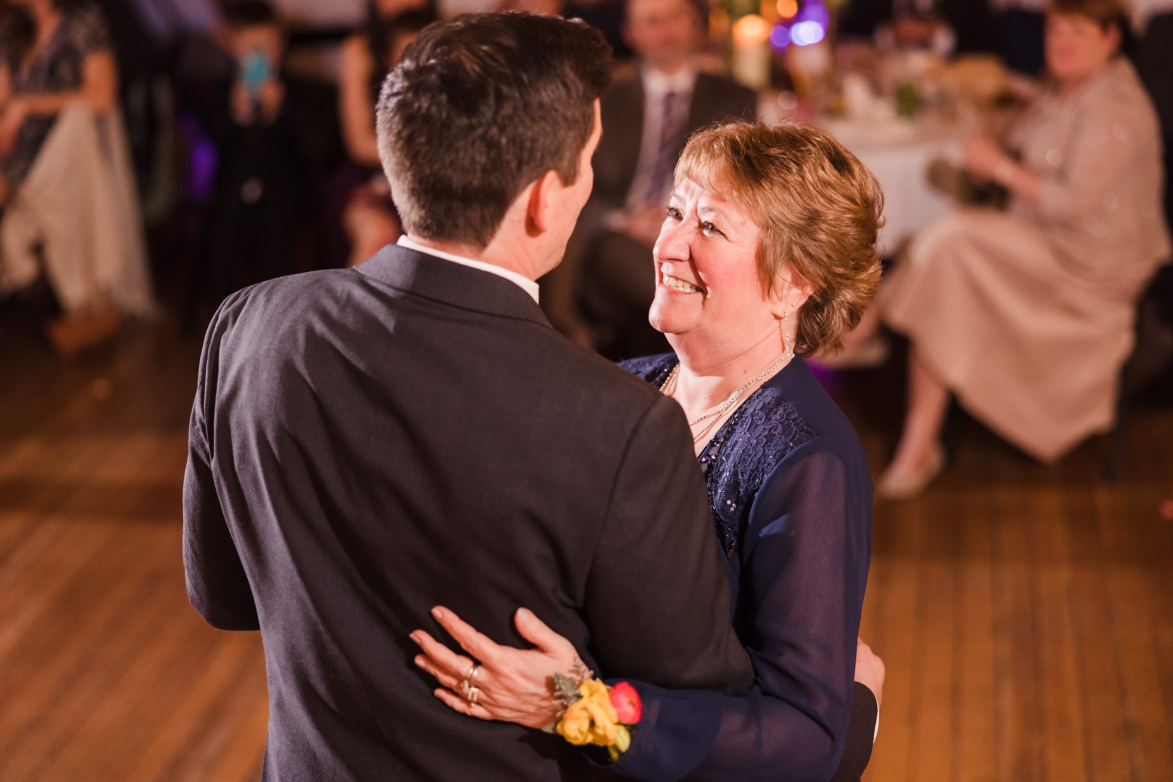 Groom dances with his mother during his wedding at the Trailside Event Center in Peoria Heights, Illinois.
