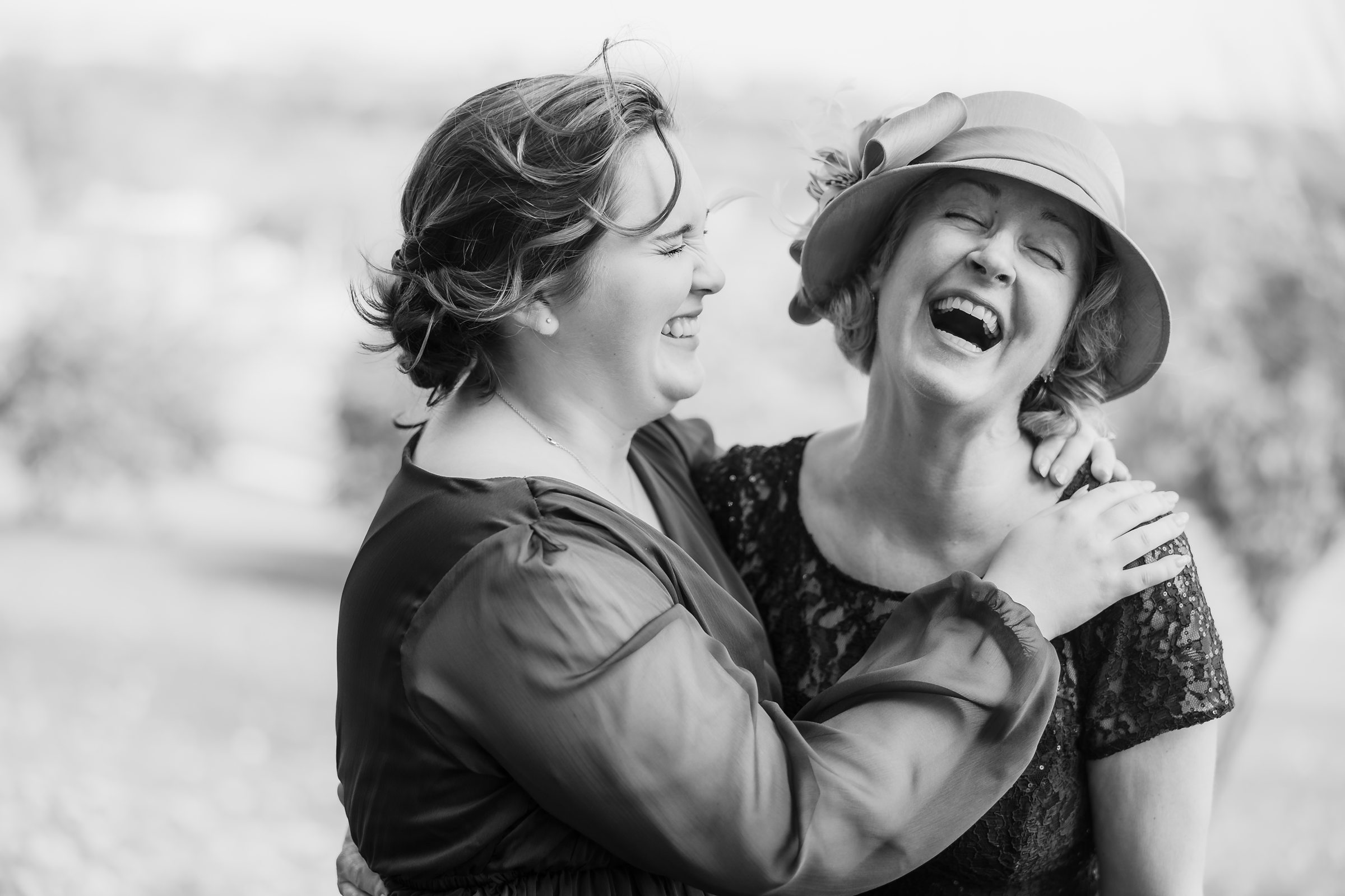Bride laughs with her mom during her wedding in Washington D.C.