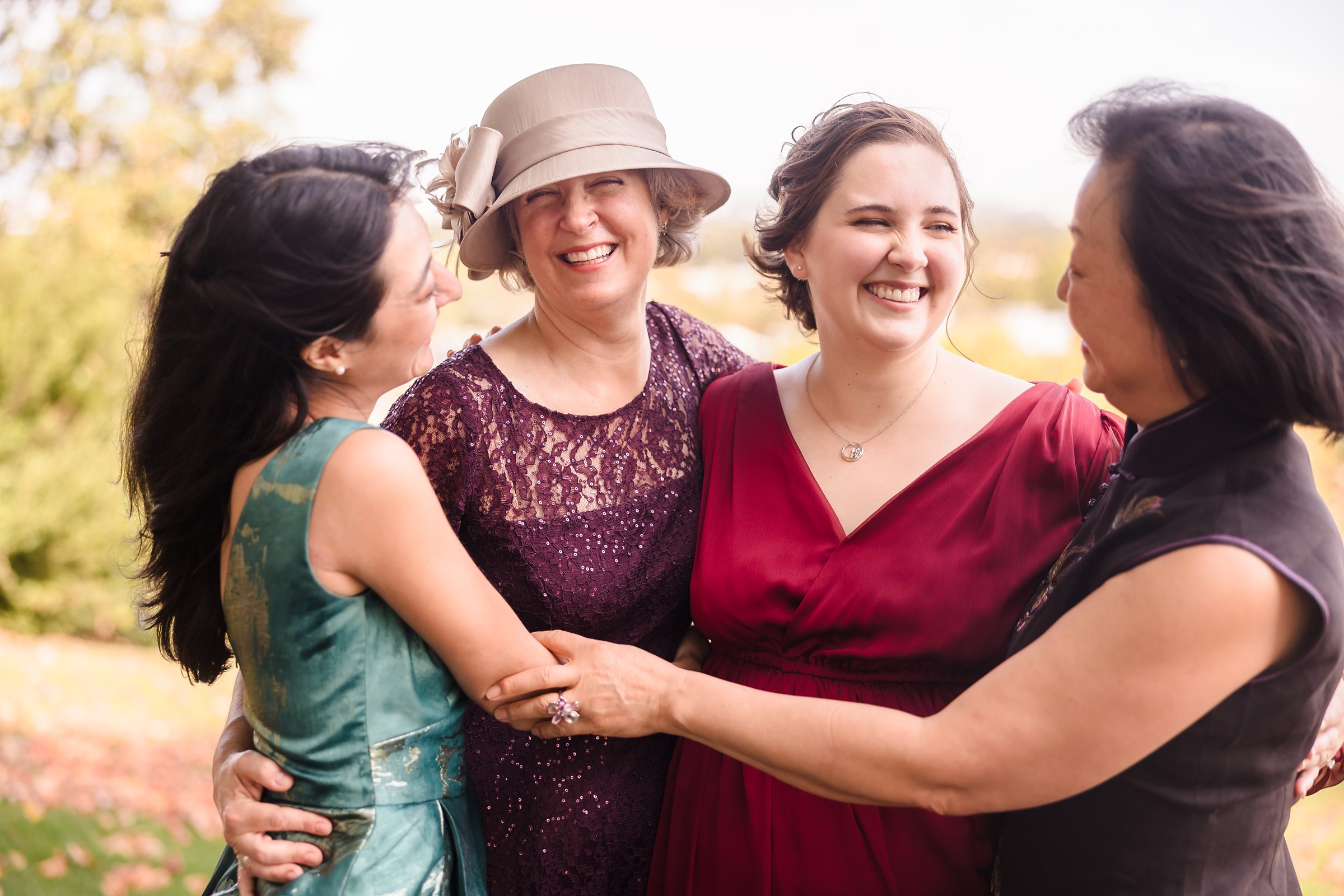 All the girls laugh together during a wedding in Washington D.C.