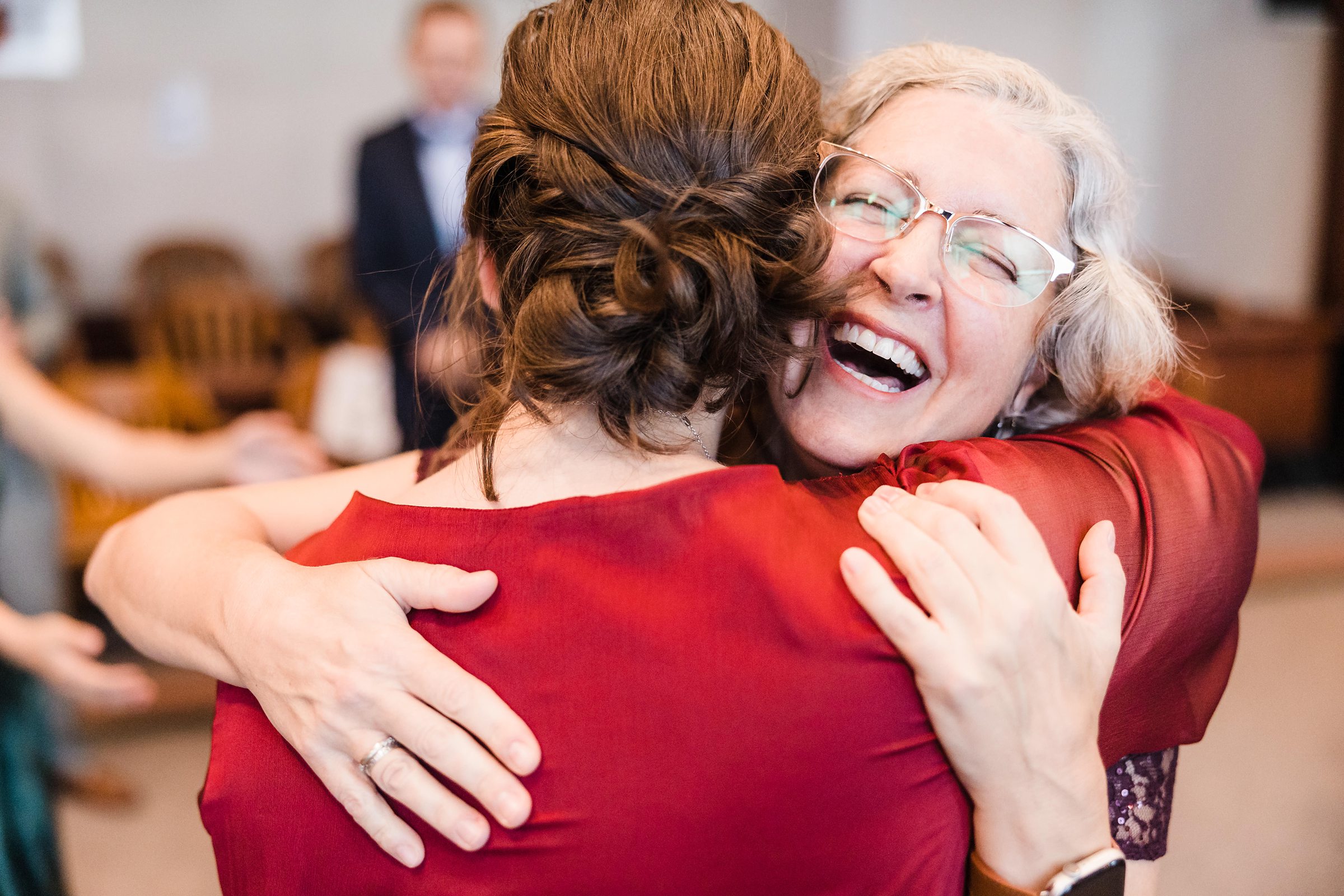 Mom hugs the bride during her wedding Courthouse wedding in Washington D.C.
