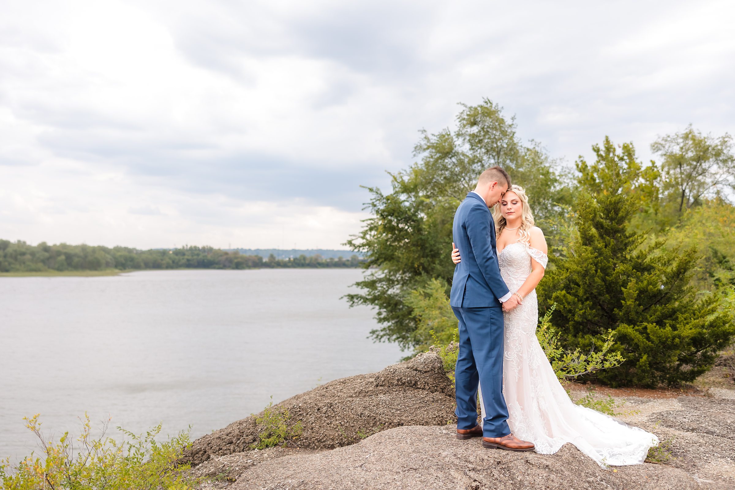 Bride embrace on the Peoria riverfront in Peoria, Illinois