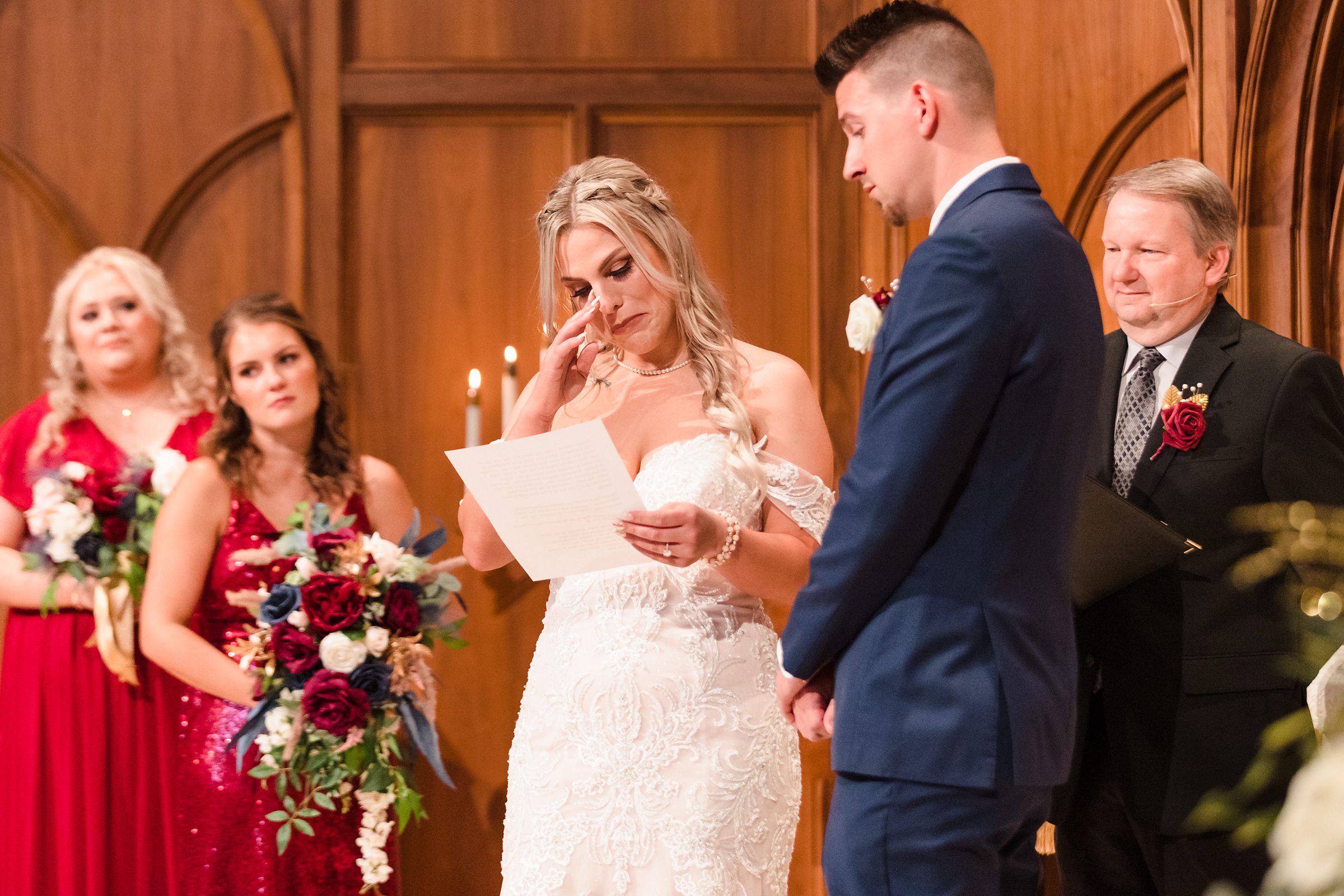 Bride gets emotional during her wedding at the First United Methodist Church in Peoria, Illinois