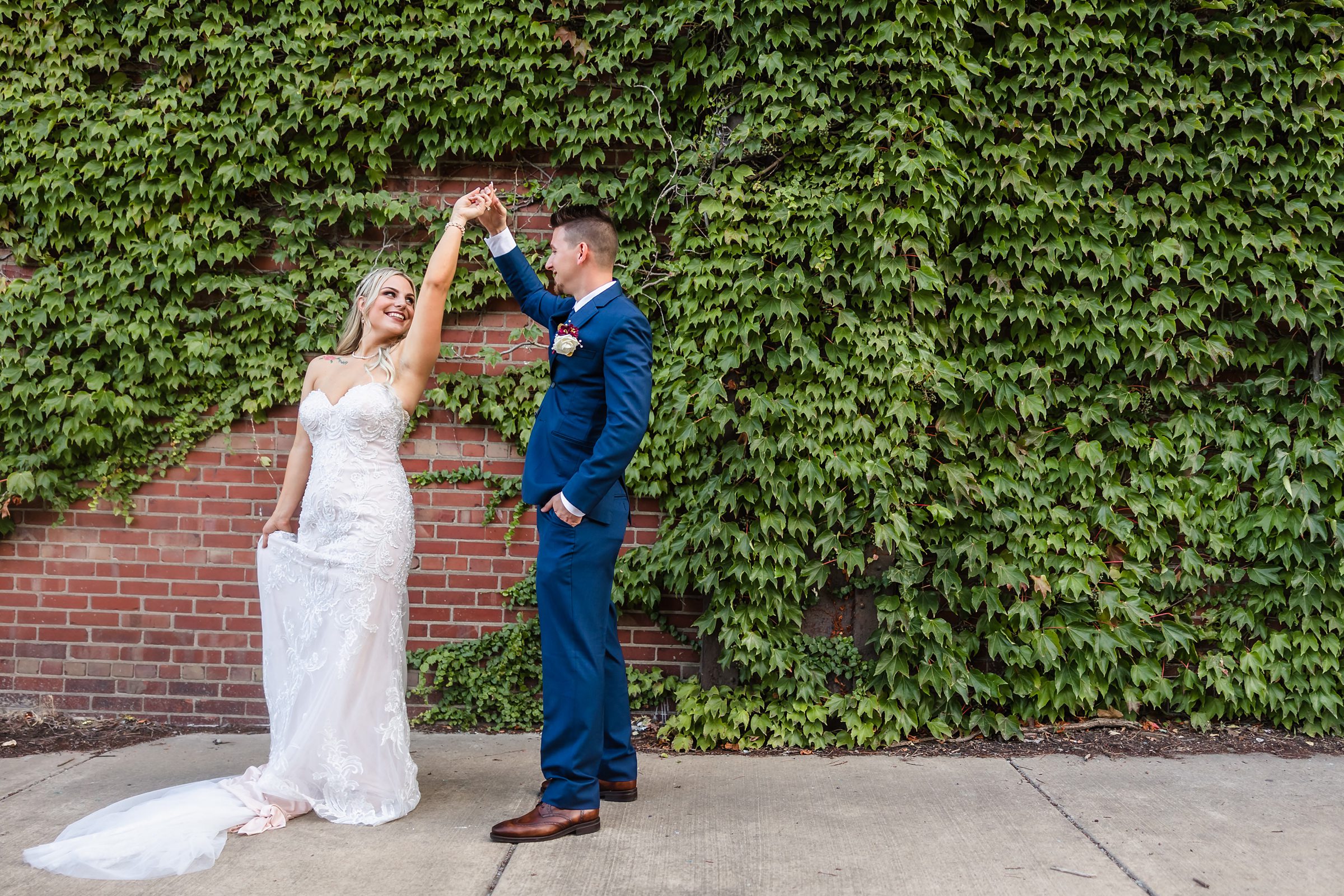 Bride and Groom embrace after their wedding ceremony at the Warehouse on State in Peoria, Illinois