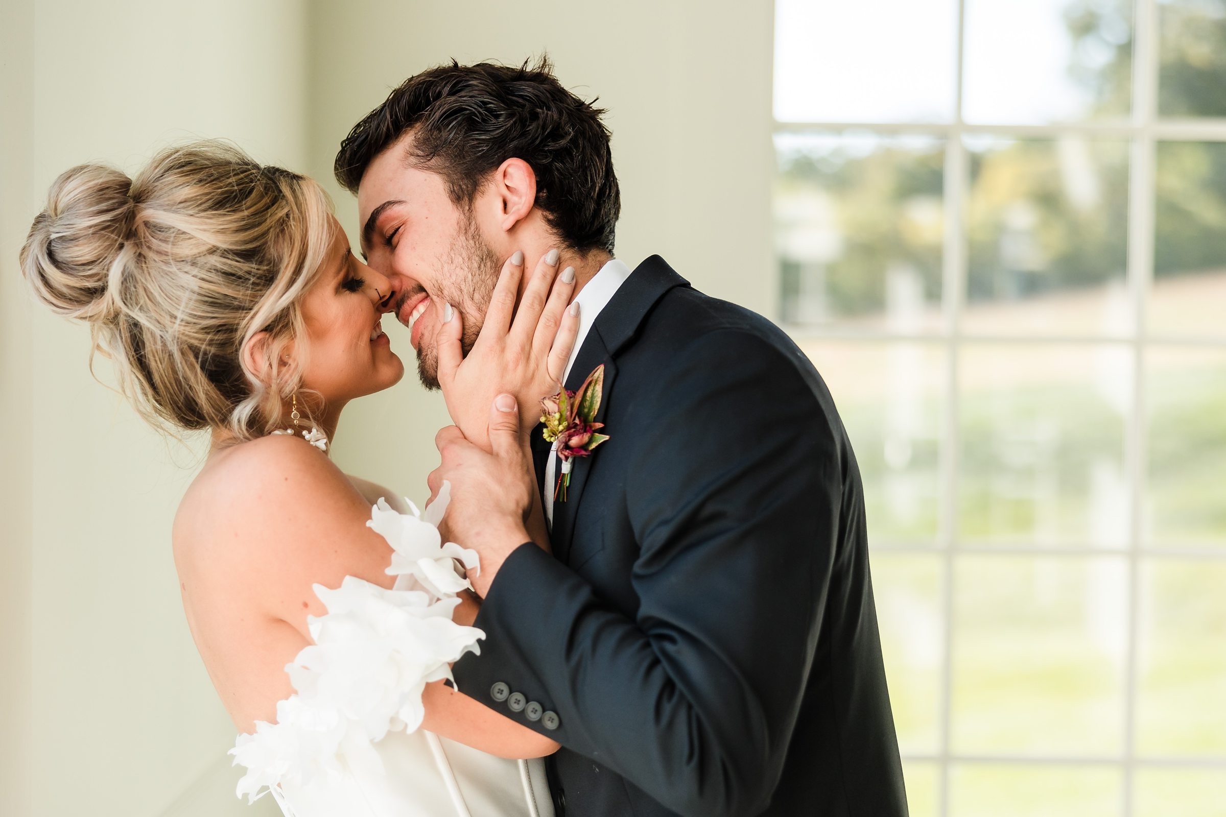 Bride and Groom Celebrate during a wedding at the Westwind Hills venue in Pacific, Missouri.