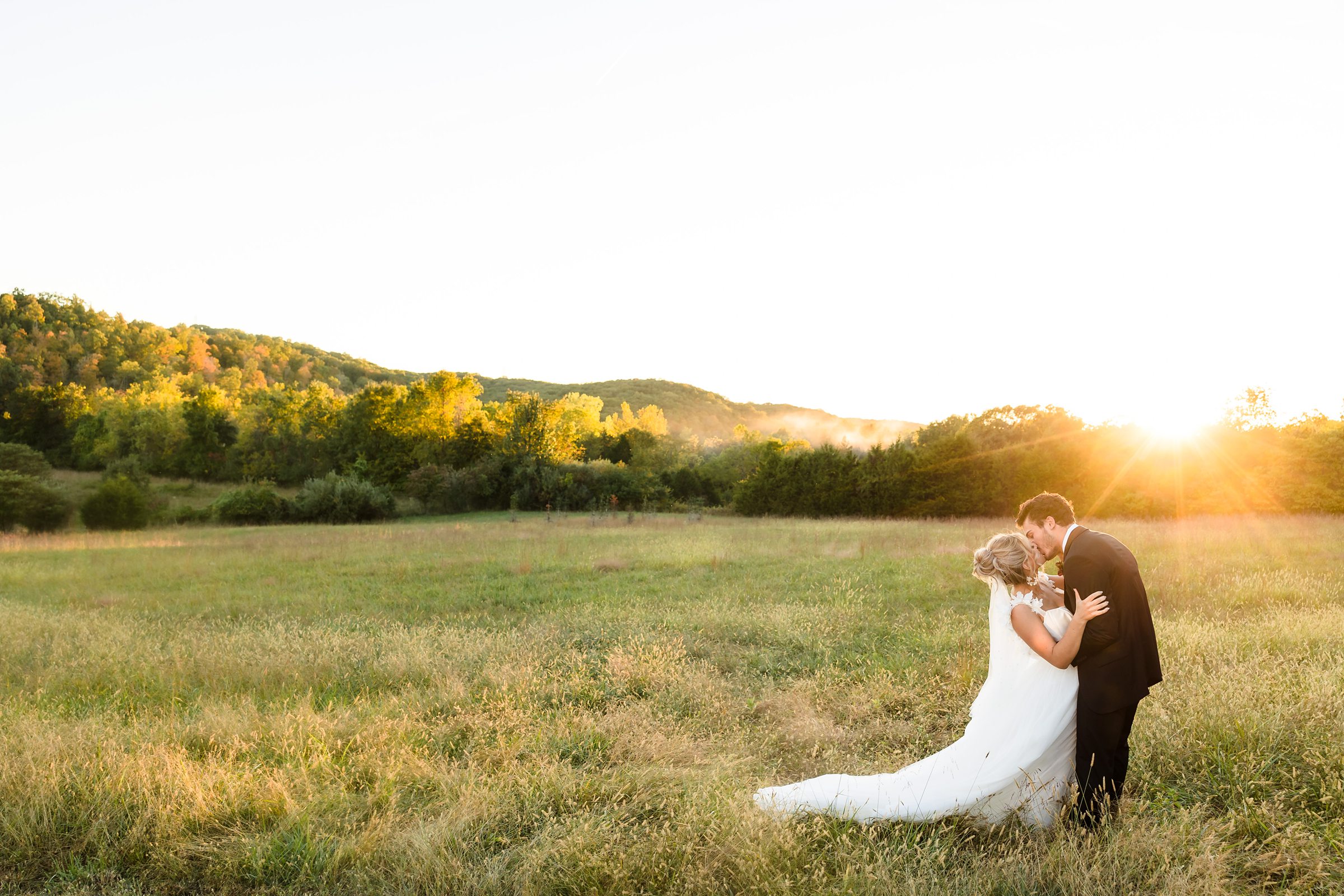 Bride and Groom Celebrate during a wedding at the Westwind Hills venue in Pacific, Missouri.