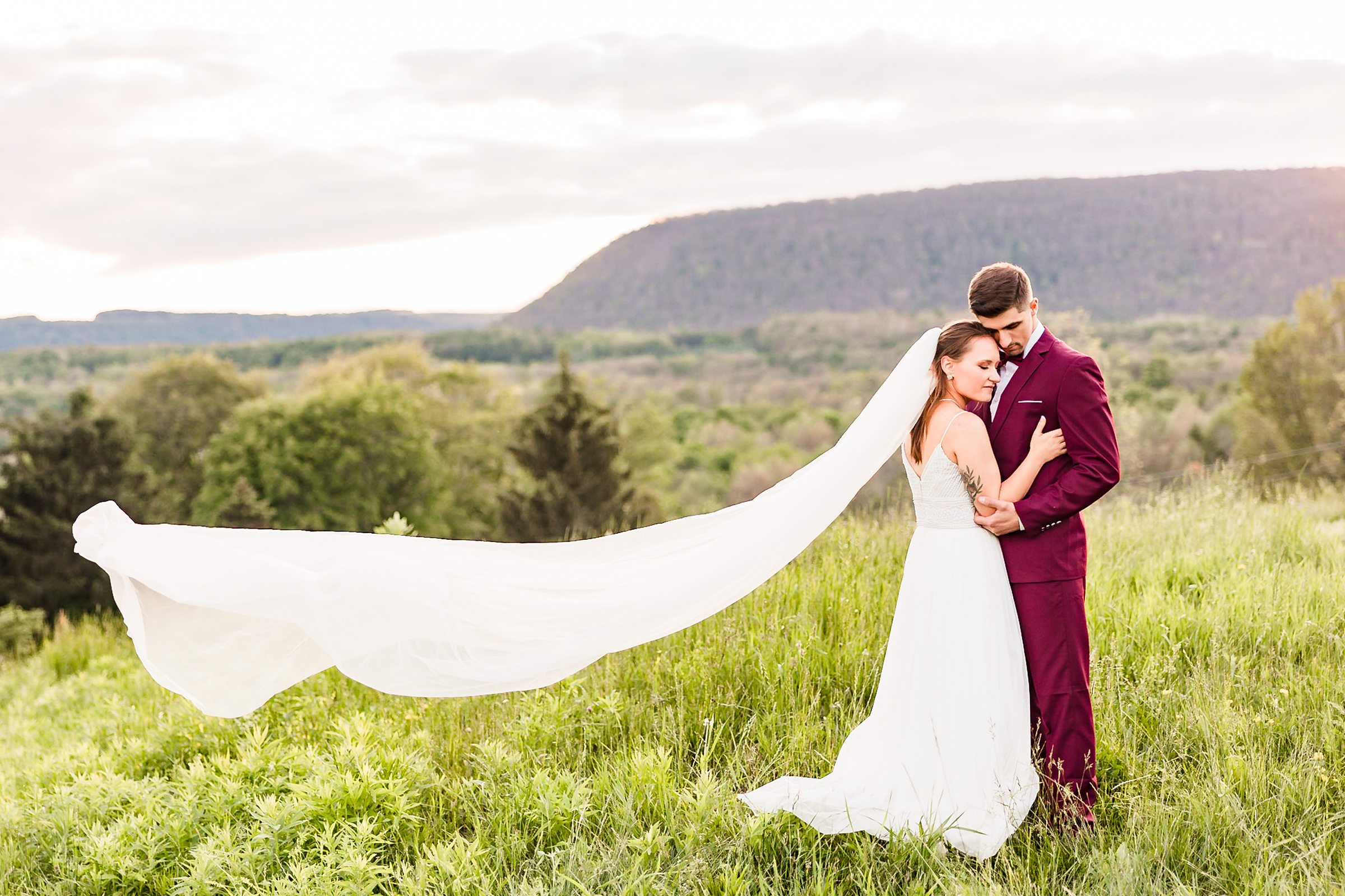 Bride and Groom celebrate getting married at the Wren's Roost Barn Venue in Naples, New York.