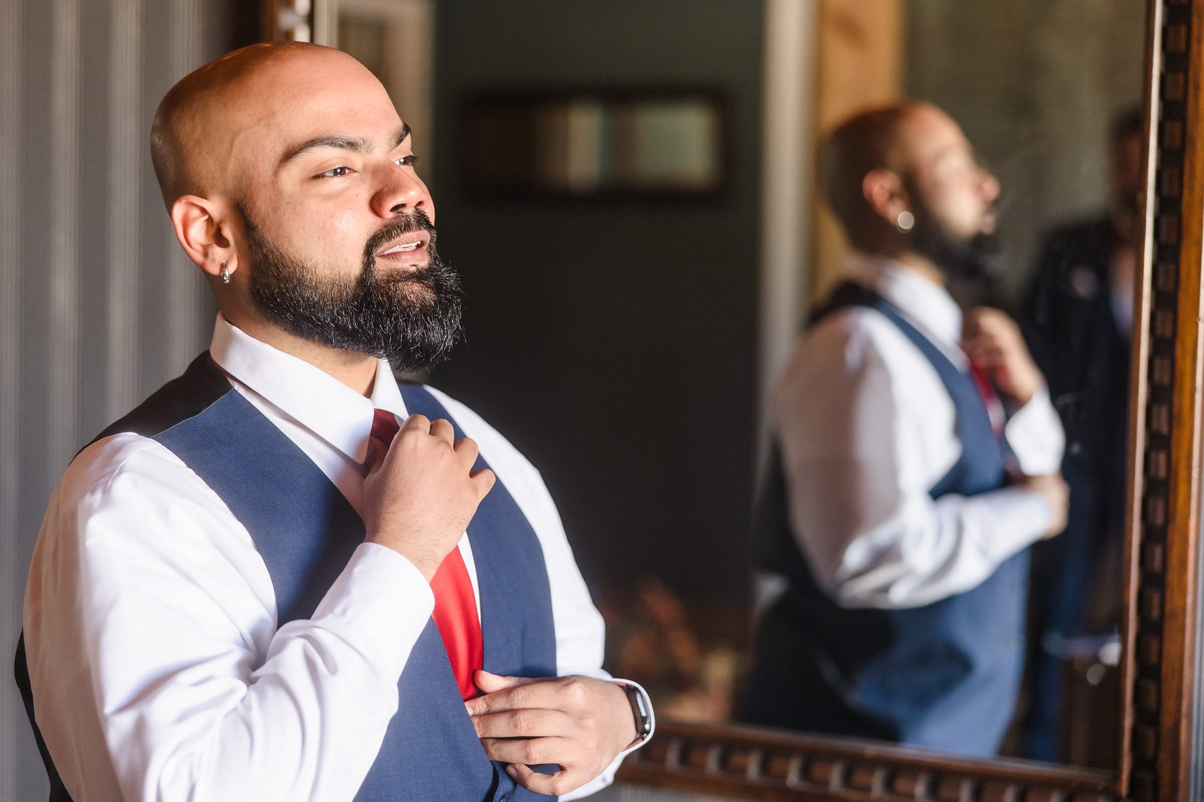 Groom gets ready for his wedding at the Legacy Building in El Paso, Illinois.