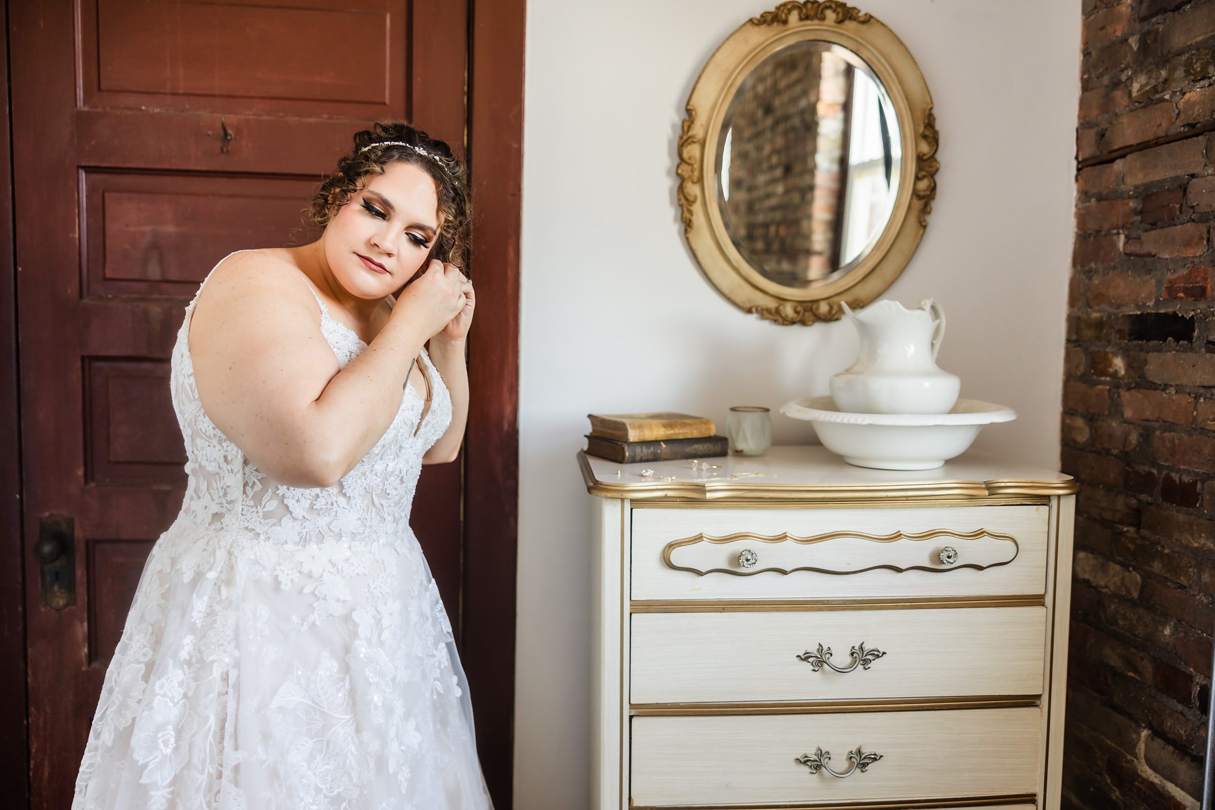 Bride gets ready for her wedding at the Legacy Building in El Paso, Illinois. 