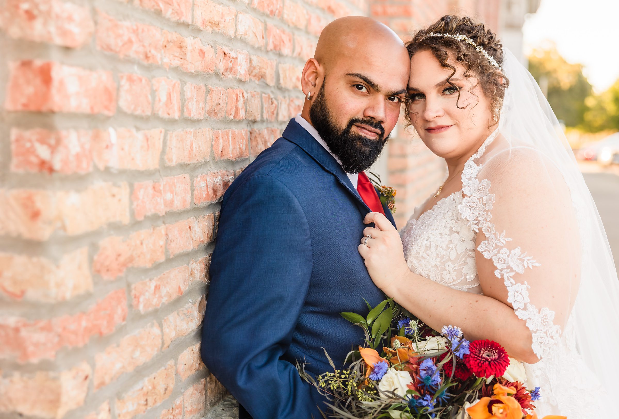 Bride and groom portrait during their wedding at the Legacy Building in El Paso, Illinois.