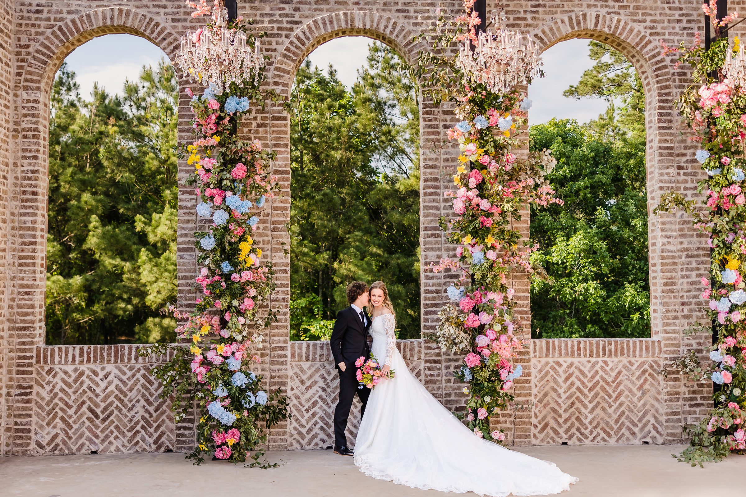 Bride and Groom celebrate their wedding at the Iron Manor in Montgomery, Texas.