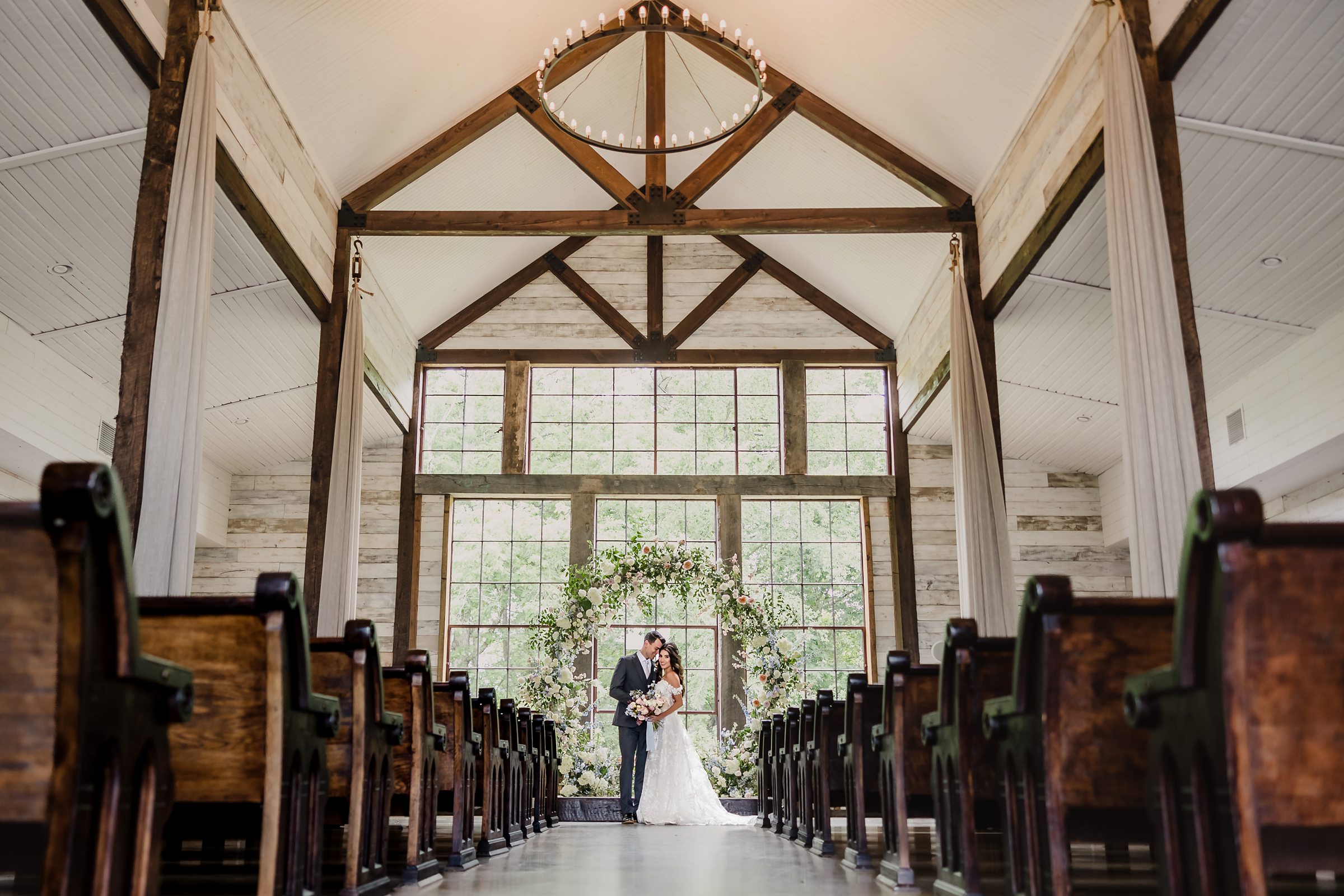Bride and Groom celebrate their wedding at the Big Sky Barn in Montgomery, Texas.