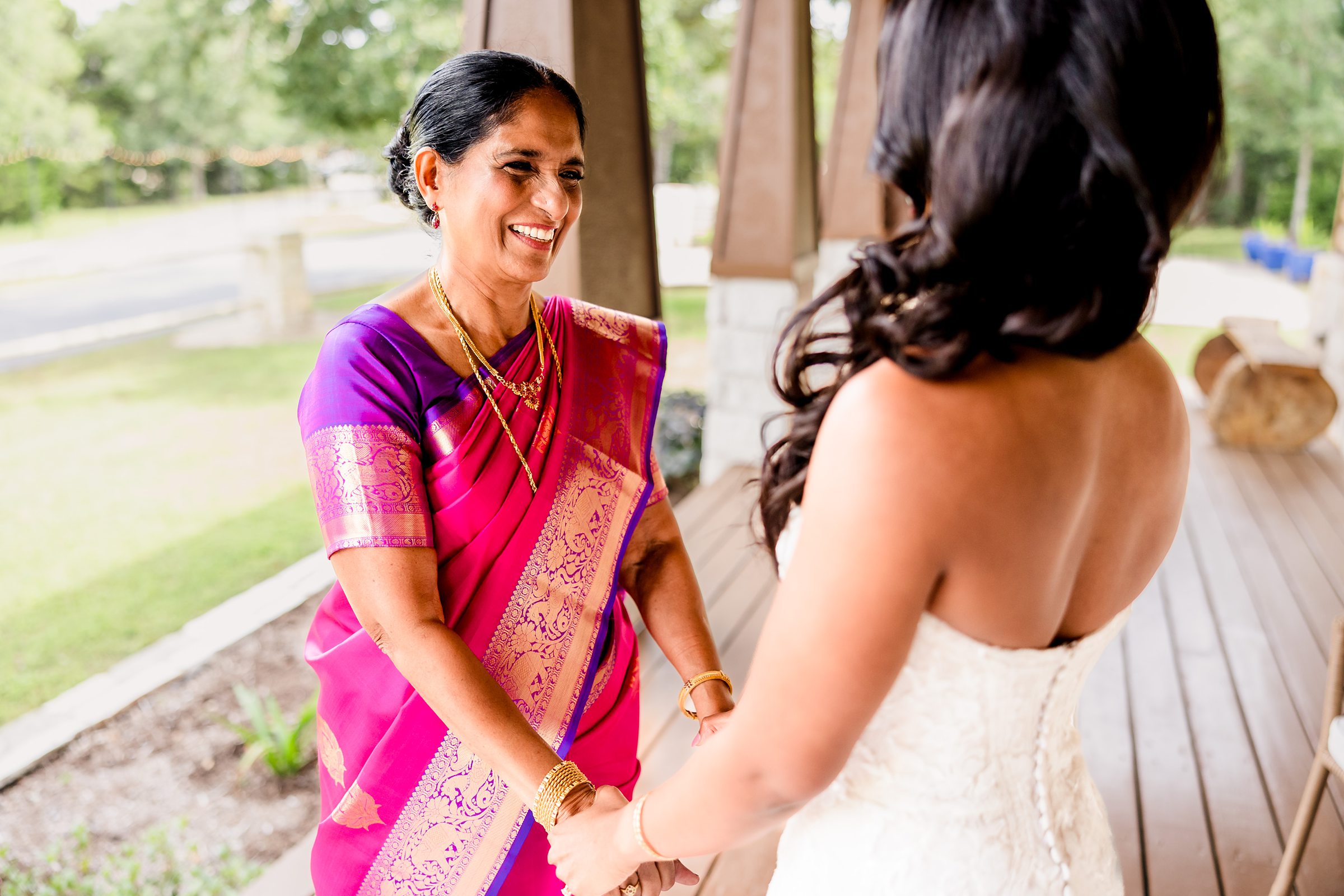 Mom and daughter share a special moment the Shiraz Garden Wedding Venue in Bastrop, Texas.