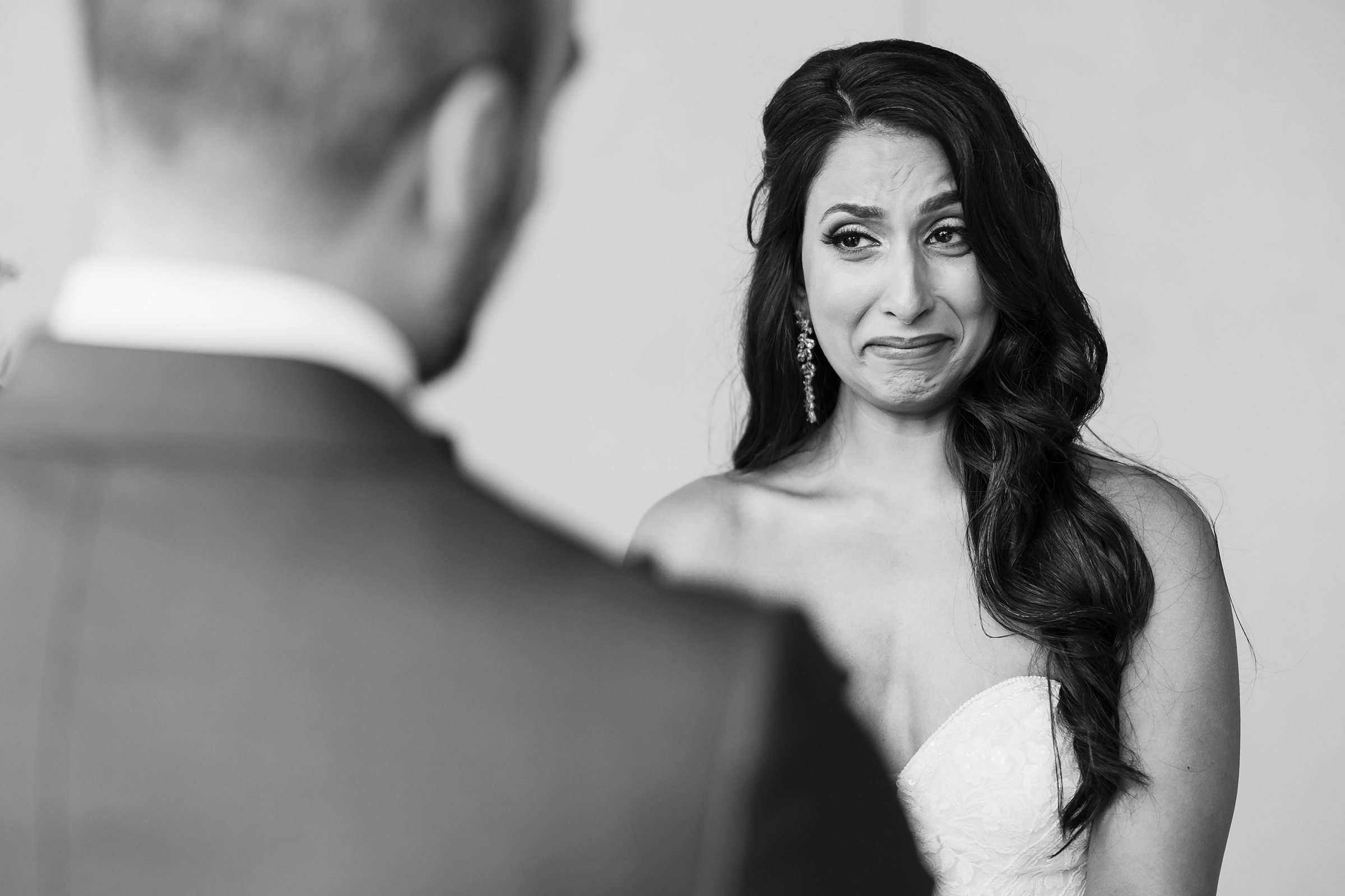 Bride gets emotional during a wedding at Shiraz Garden in Bastrop, Texas.