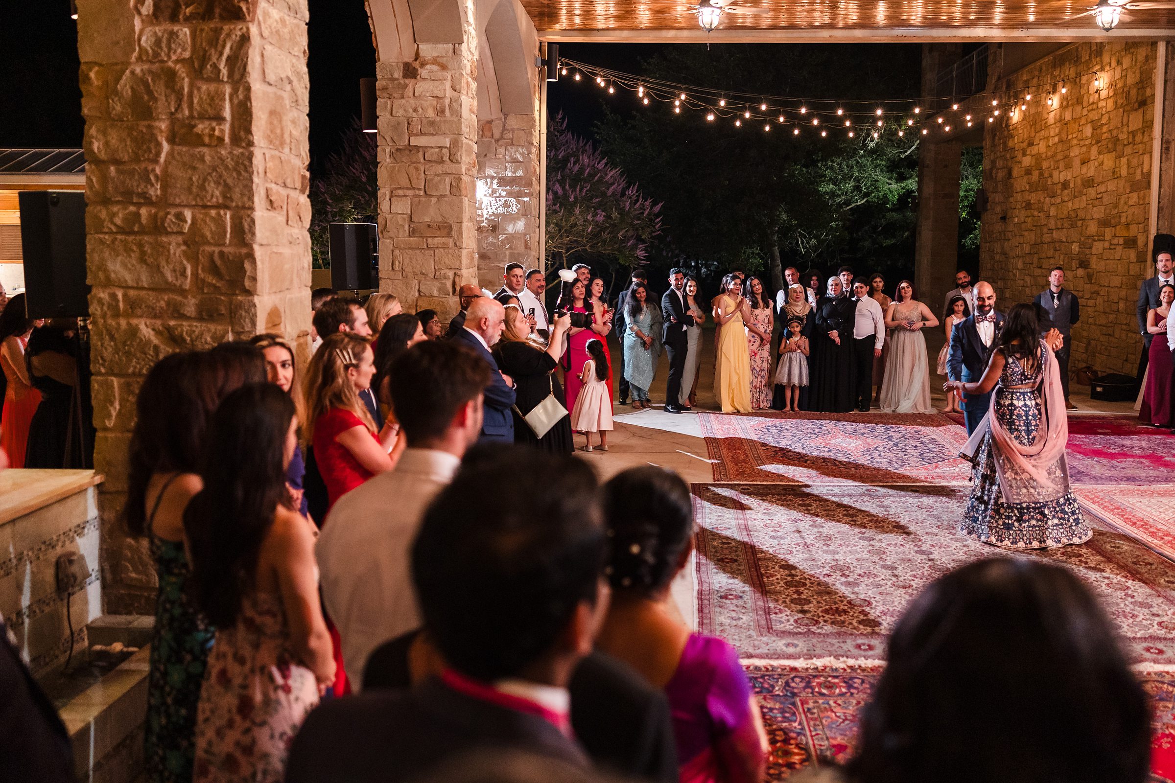 Bride and groom share their first dance during a wedding at Shiraz Garden in Bastrop, Texas.